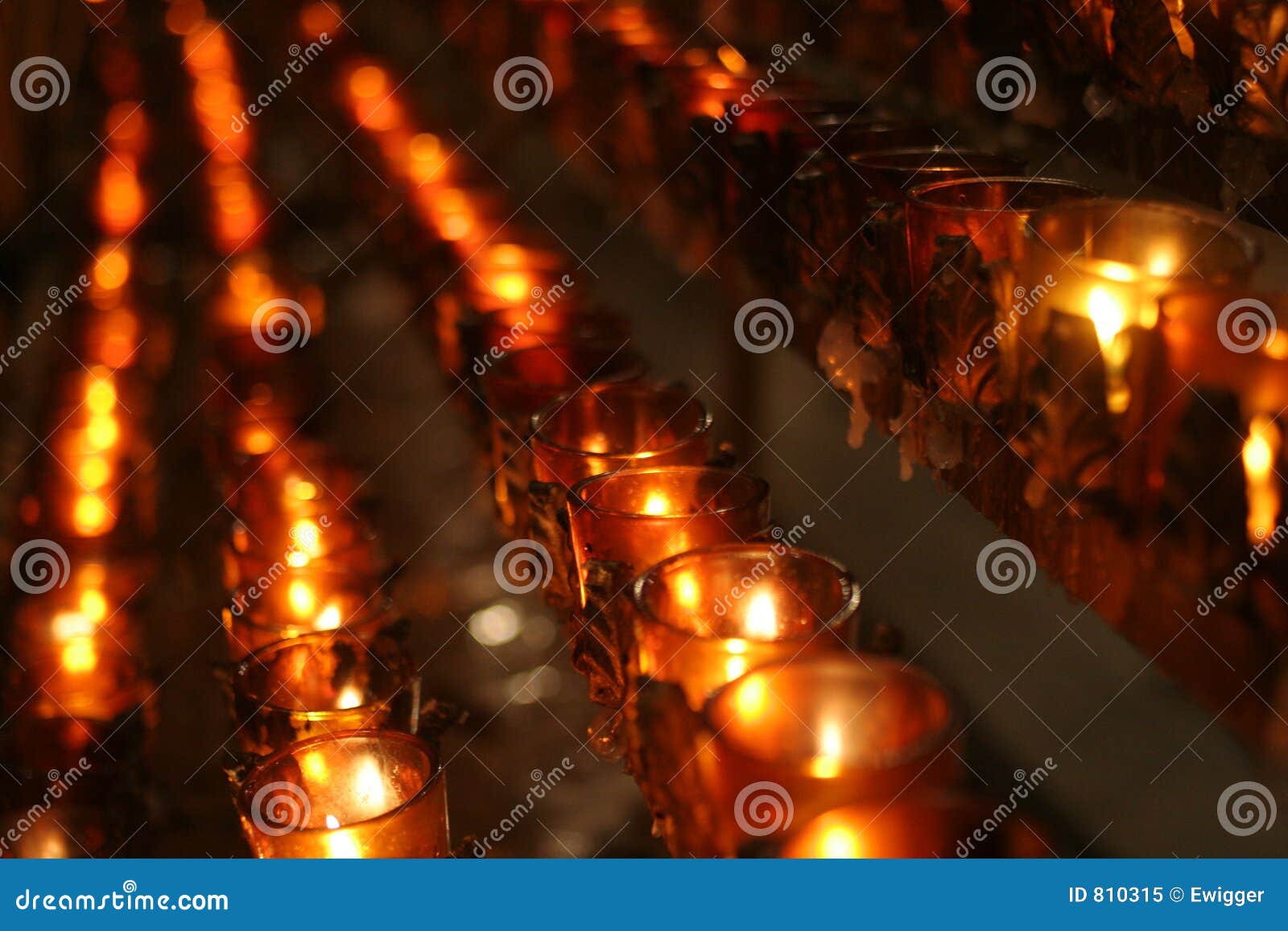 Prayer Candles Tied Together And Lit At An Altar Of A Church Royalty