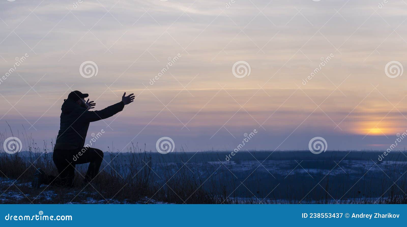 Prayer. Repentance. Silhouetted Men On A Background Of Blue Sky And ...