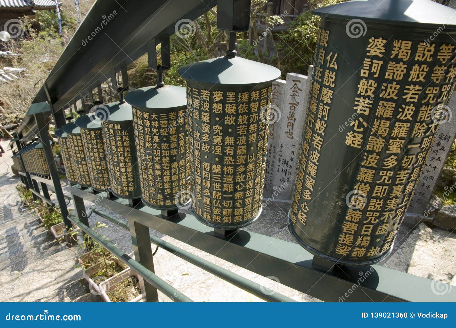 prayer wheels in daishouin buddhist temple, japan