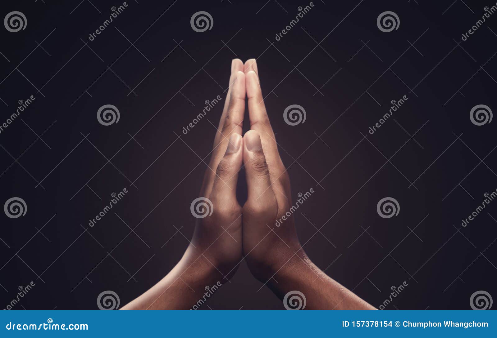 praying hands with faith in religion and belief in god on dark background. power of hope or love and devotion. namaste or namaskar