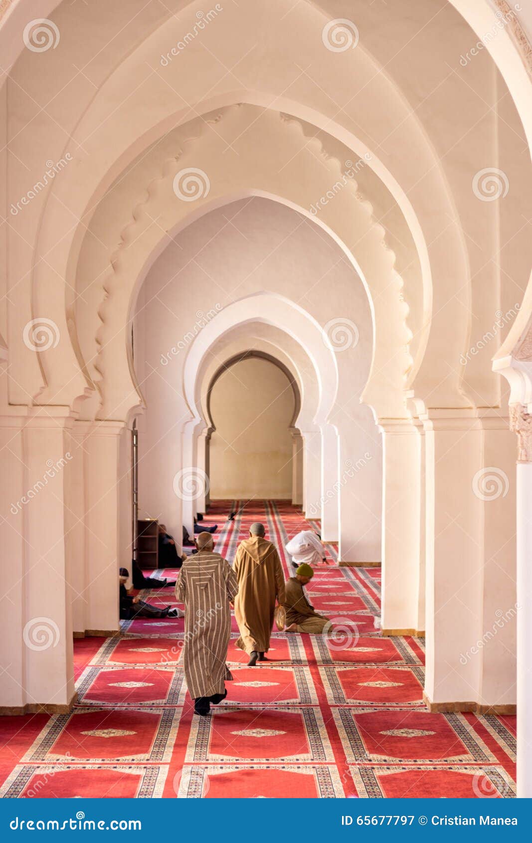 praying muslims inside a mosque