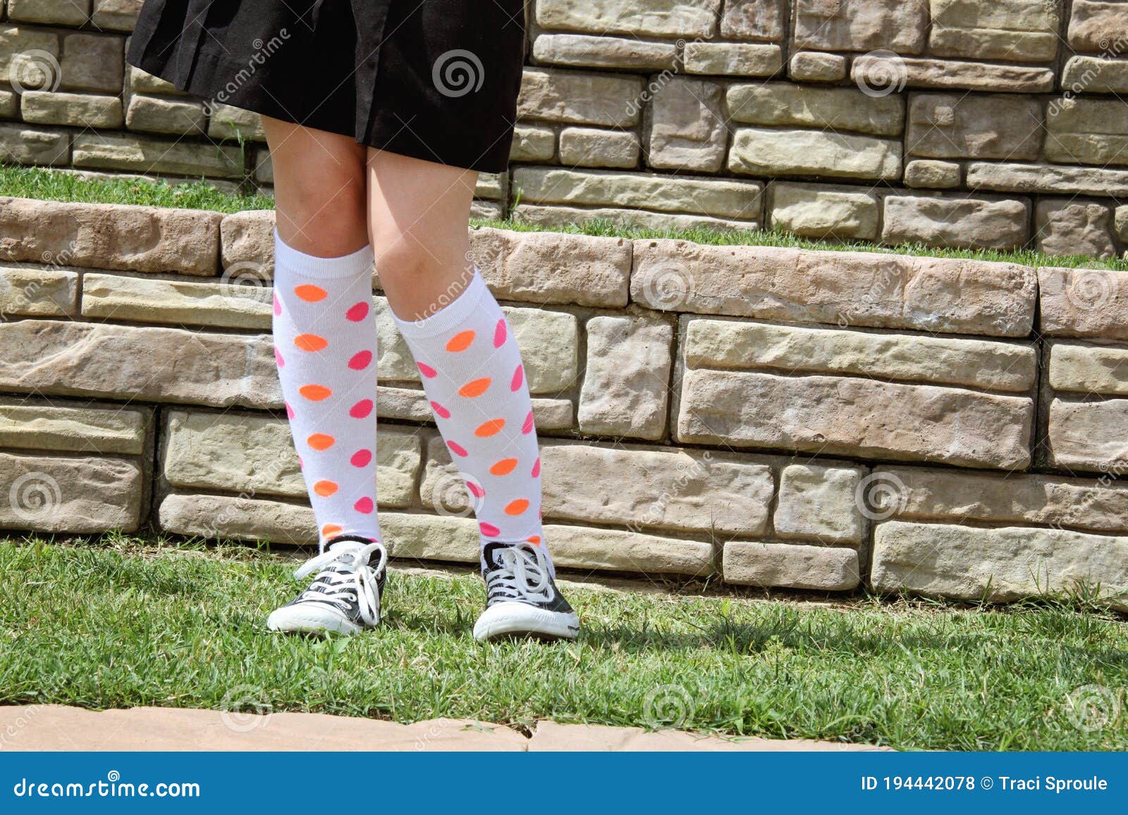 Pre-teen Girl Shows Off with Knee-High Stock Photo - Image of orange: 194442078