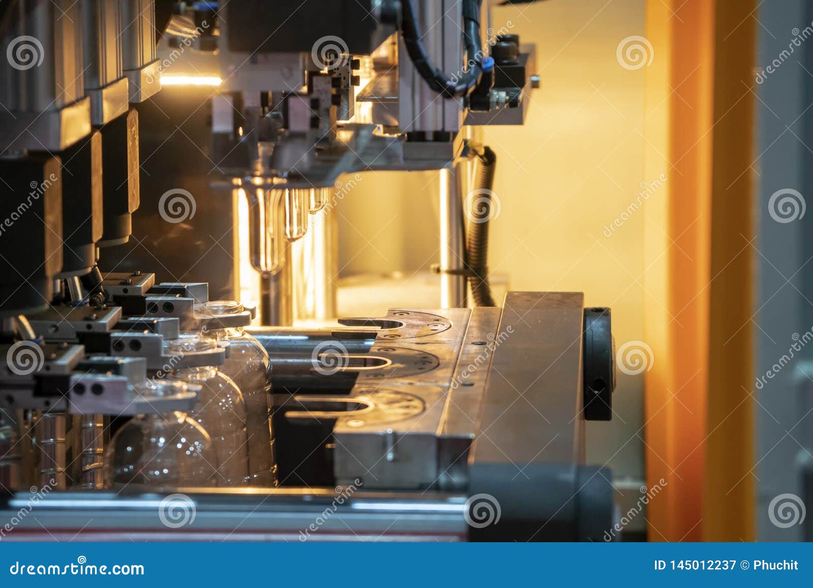 The Preform Shape of Plastic Bottles in the Heater Conveyor Belt for