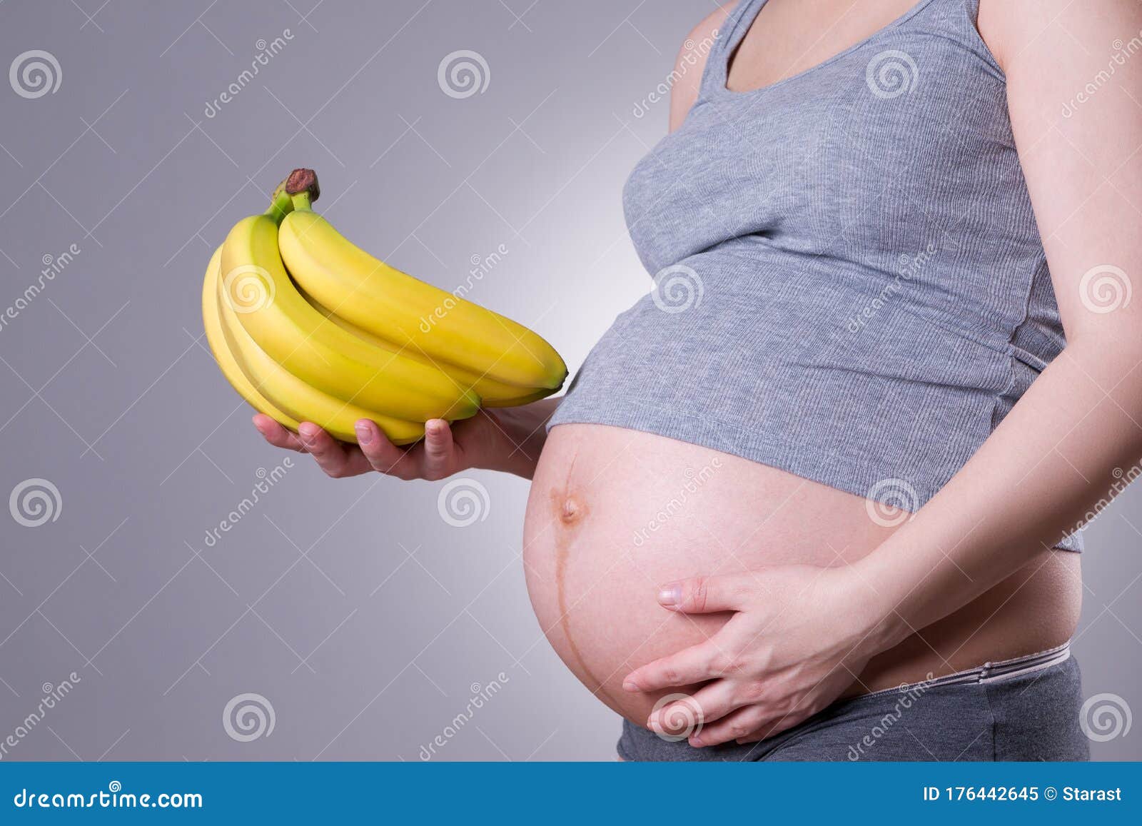 Woman With Bananas In Hands In Hat Exotic Fruits Lifestyle Pink Background Royalty Free Stock