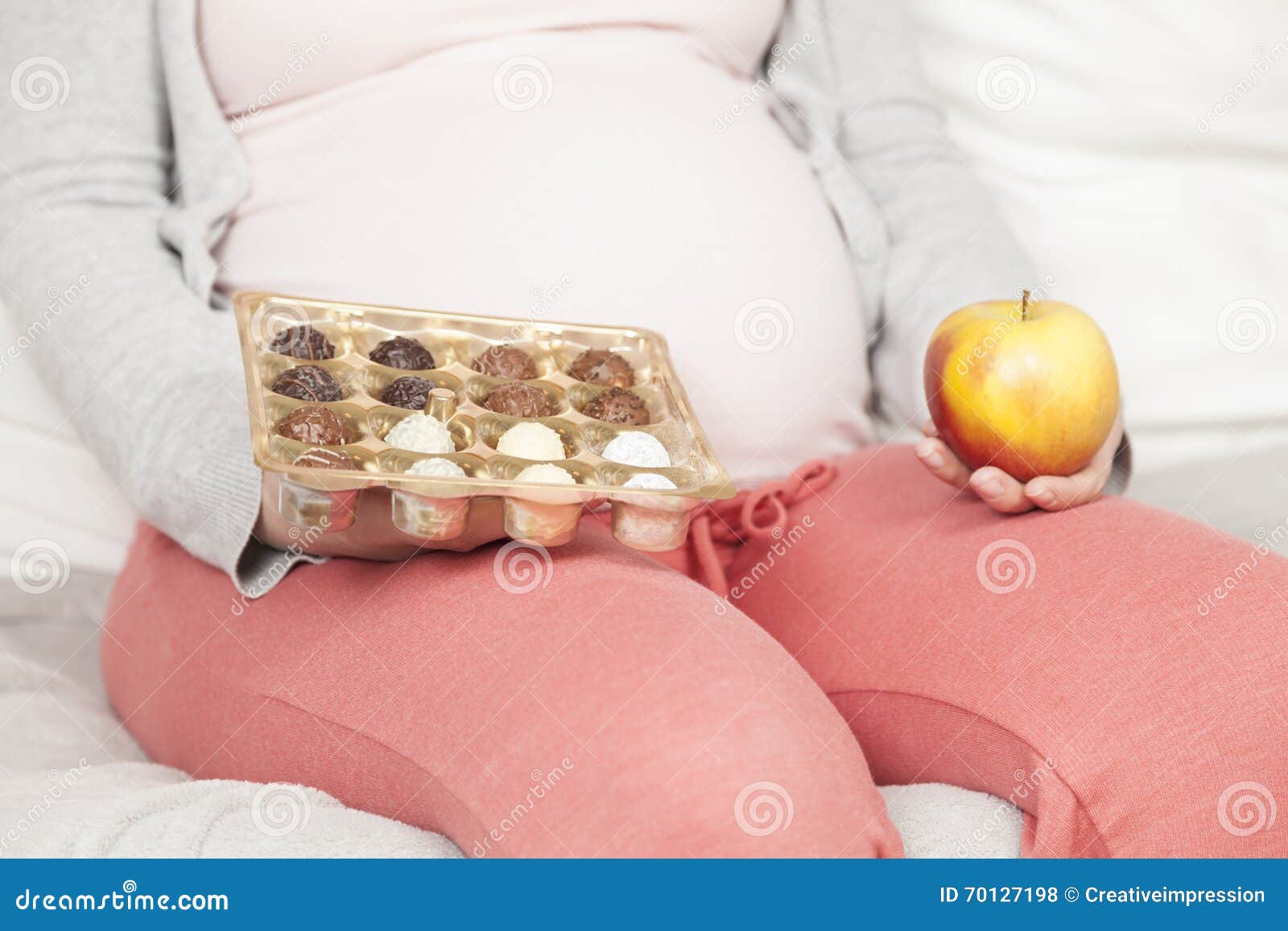 Pregnant with Candy and Apple Stock Photo Image of chcolate