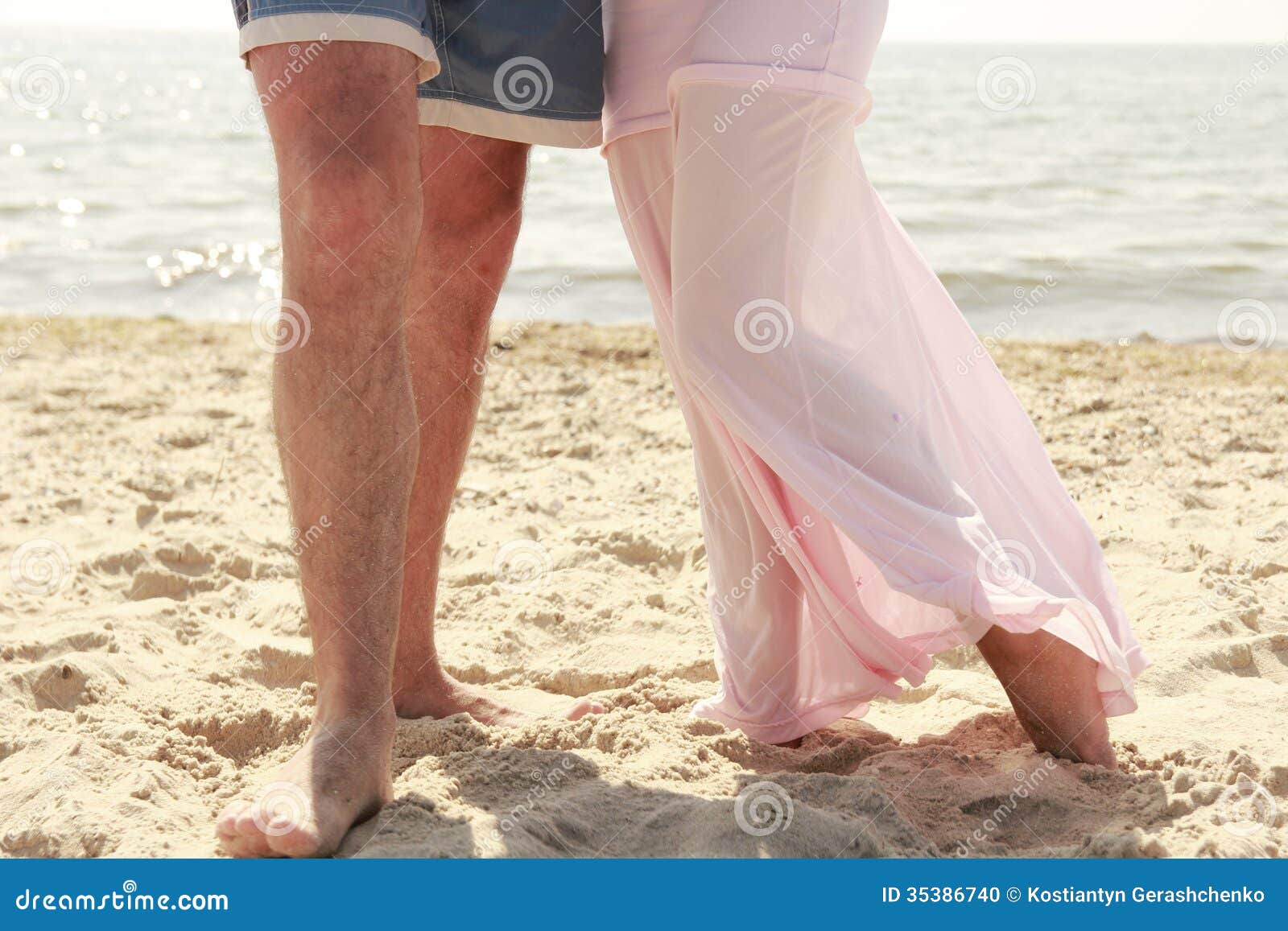 Pregnant Couple in Love Feet on the Beach Stock Photo - Image of couple ...