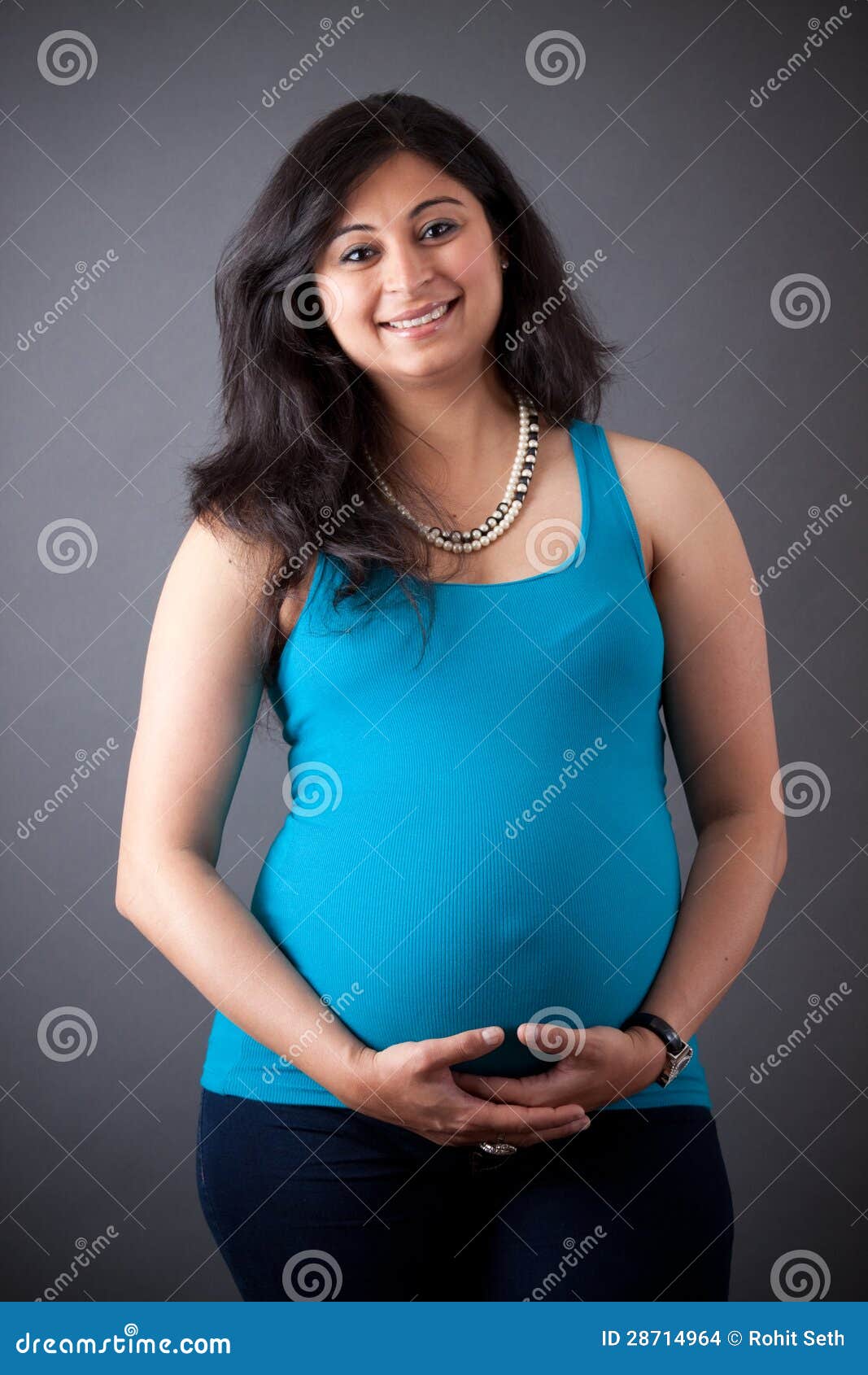 957px x 1300px - Pregnant East Indian Woman stock photo. Image of casual - 28714964