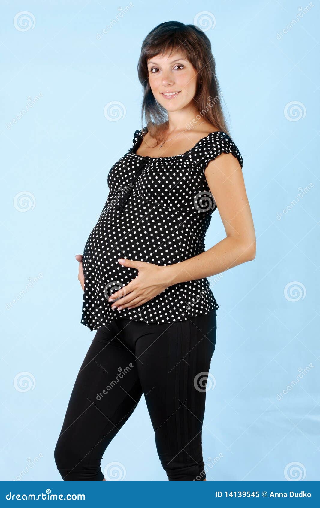 Pregnant female on blue background