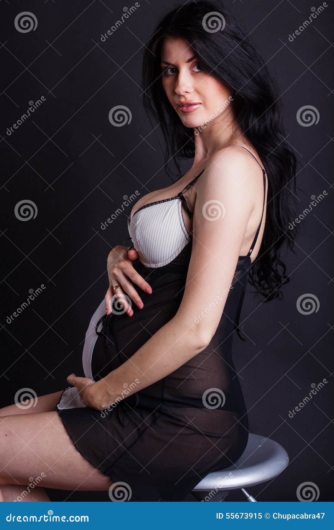 Pregnant Girl is Wearing Black Negligee Stock Image