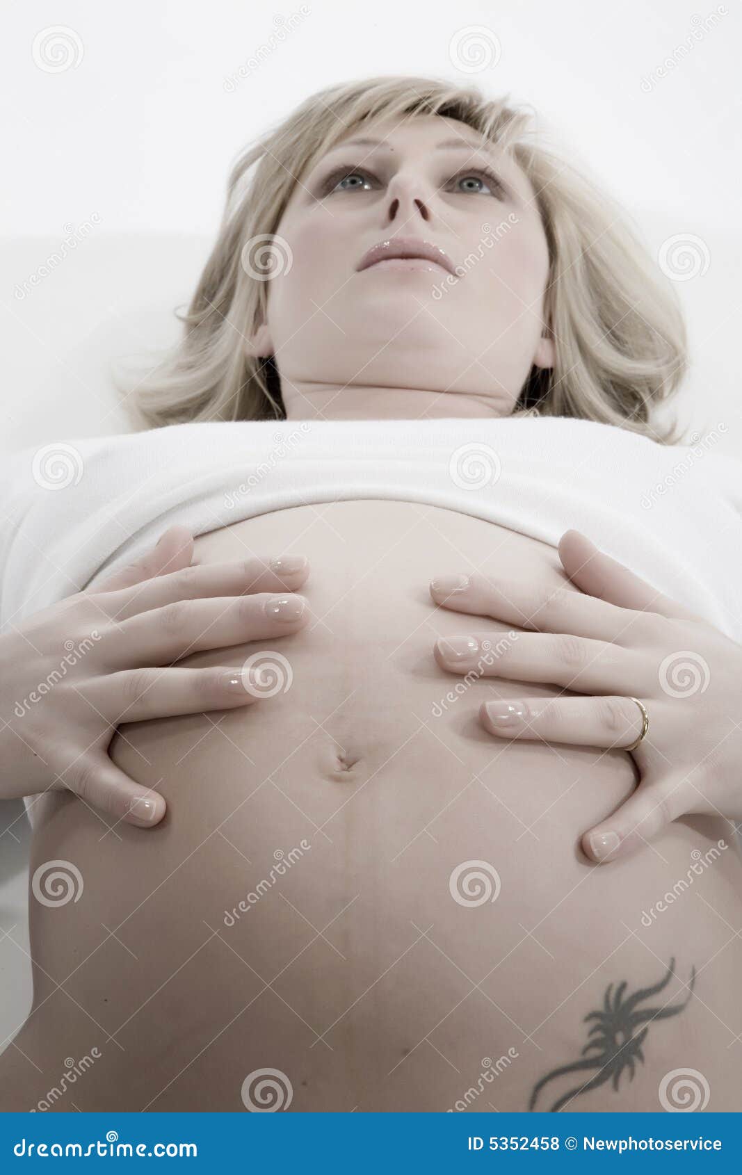 Pregnant Woman Sitting Office Chair Touching Belly Stock Photo by  ©HayDmitriy 275243902