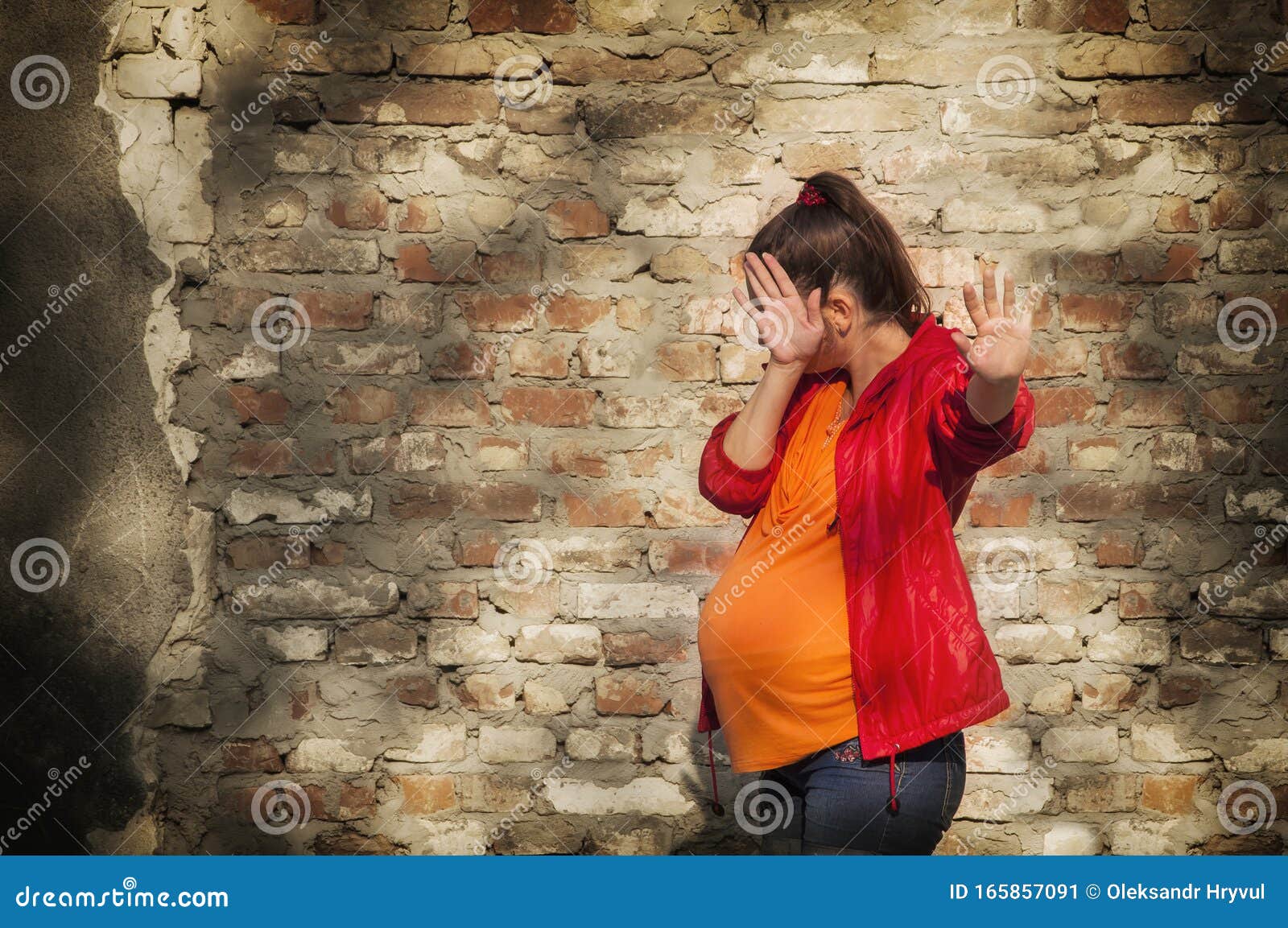 Pregnant Woman Is Afraid She Raised Her Hands As A Sign Of Protection From Fear And Negative