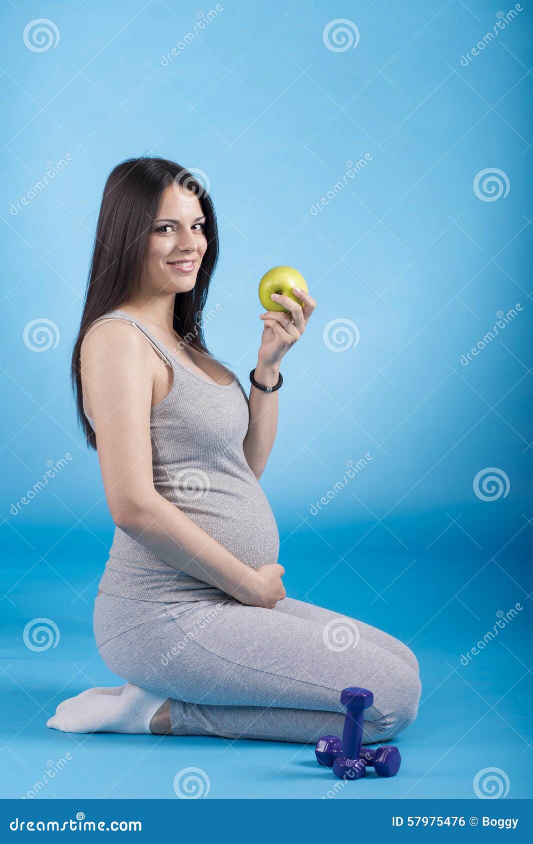 Pregnant Woman with the Apple Stock Photo Image of hand, apple 57975476