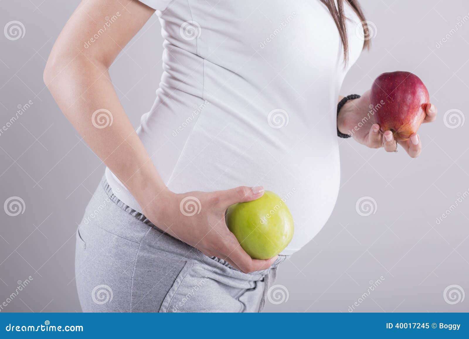 Pregnant woman with apples stock image. Image of caucasian 40017245