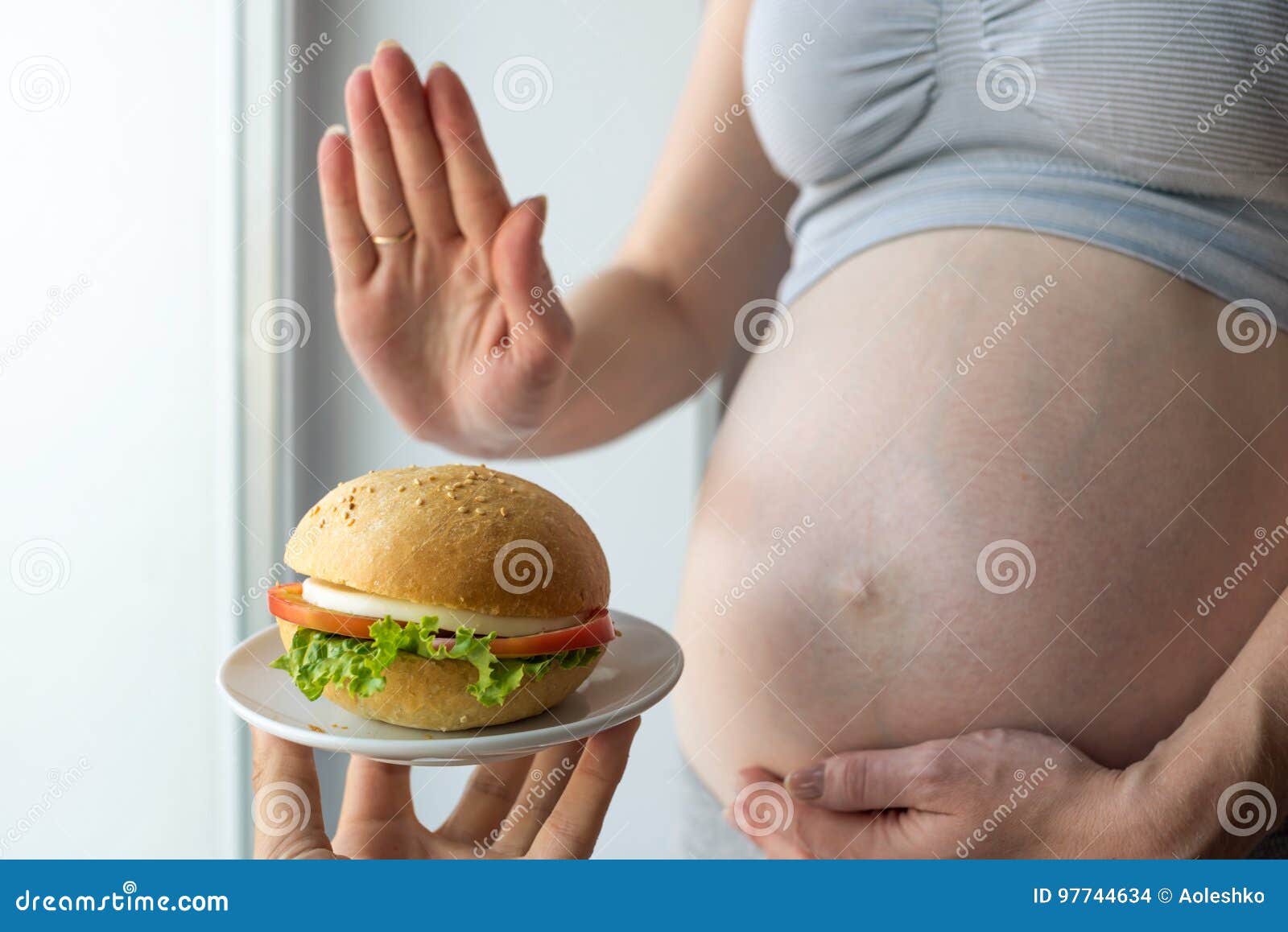 A Pregnant Woman With Belly By The Window Refuses To Burger ... A Pregnant Woman With Belly By The Window Refuses To Burger ...