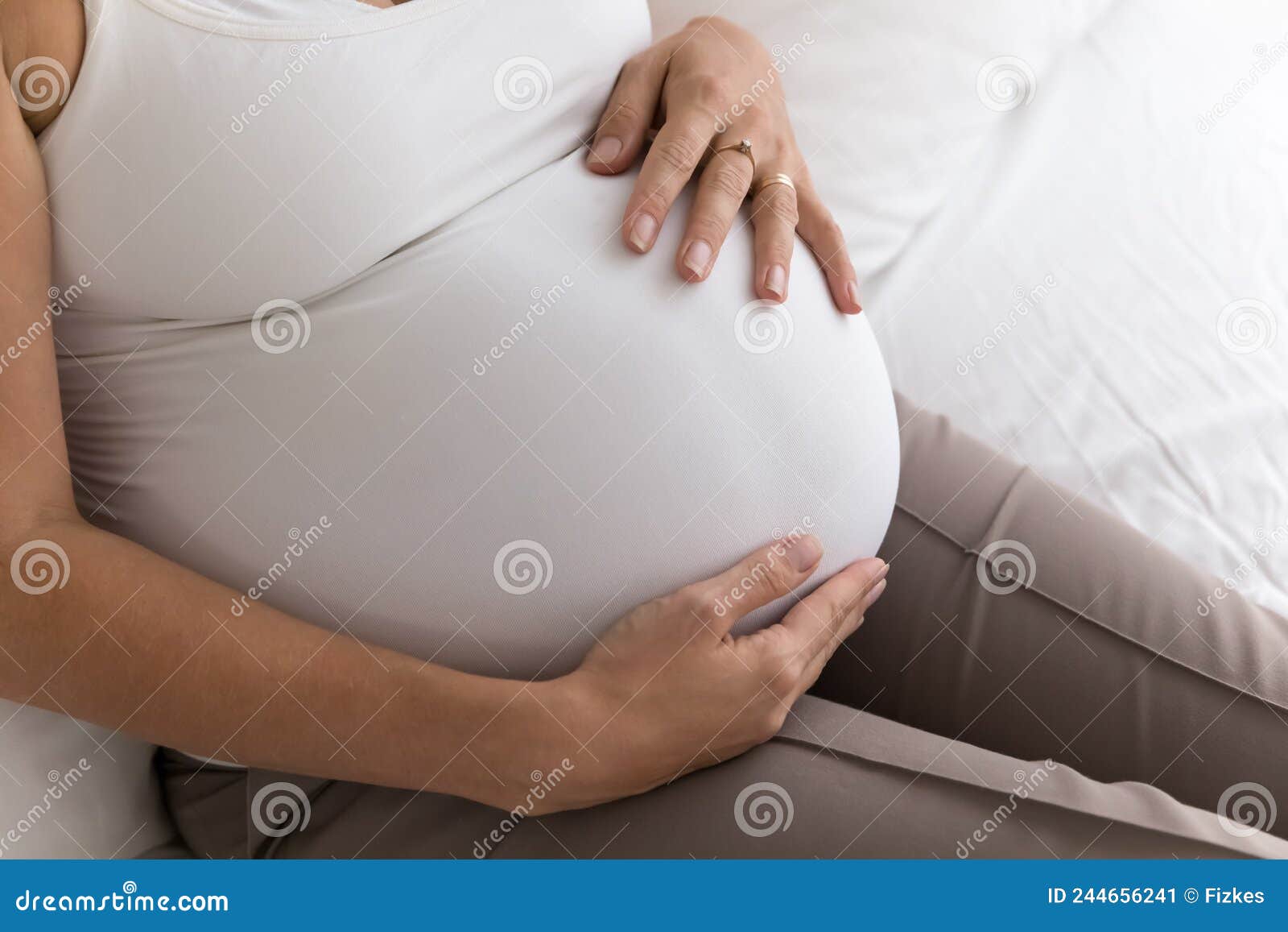 Pregnant Woman Big 9 Month Baby Bump Under White Cloth Stock Image