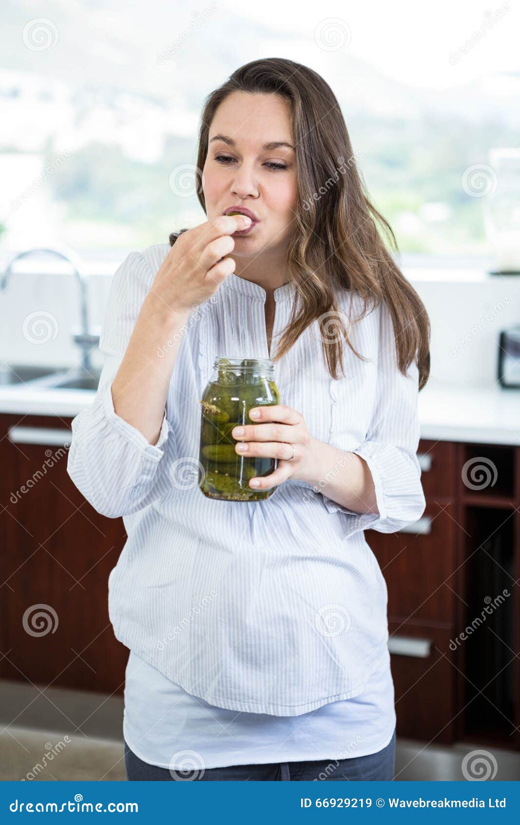 Pregnant Woman Eating Pickles Stock Image Image of interior