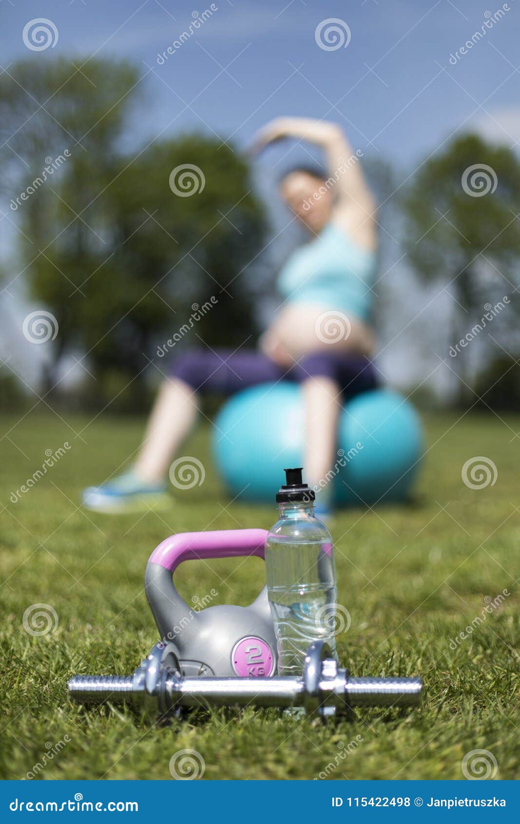 pregnant woman excercises with gymnastic ball