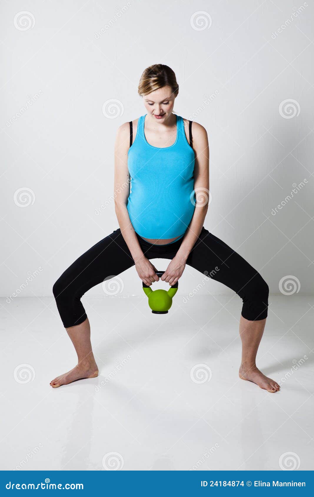 Pregnant Woman Exercising with Kettlebell Stock Photo Image of happy, blue 24184874