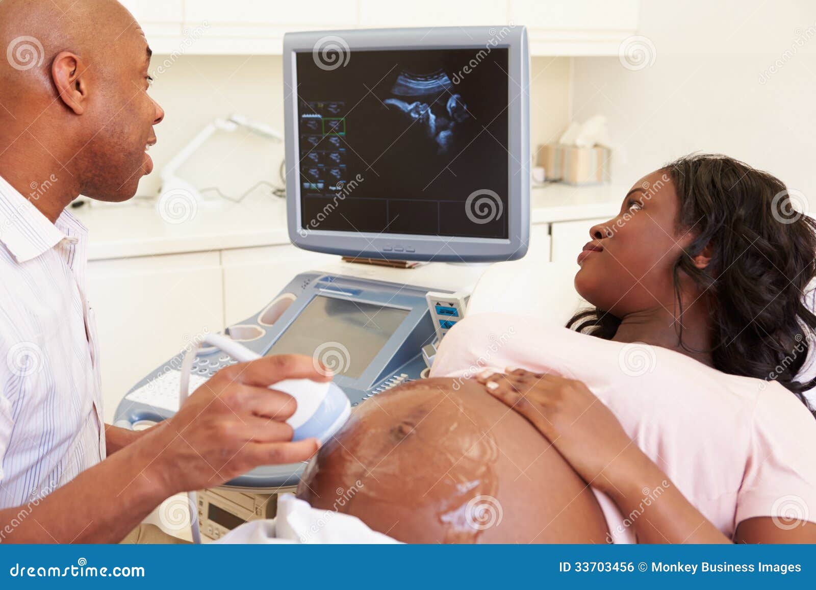 Woman 4D Ultrasound Scan Stock Photo - Image lying, medical: 33703456