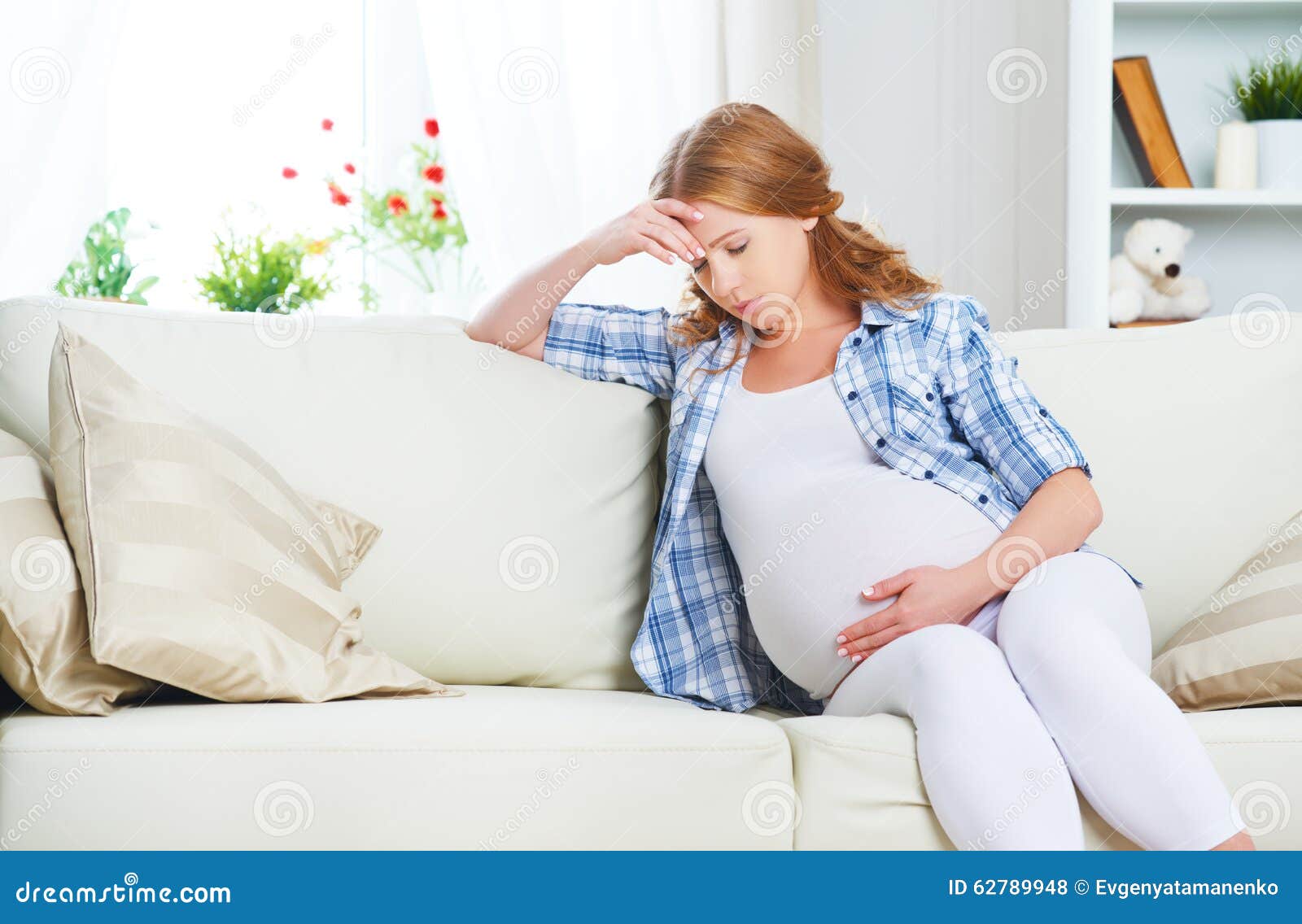 pregnant woman with headache and pain