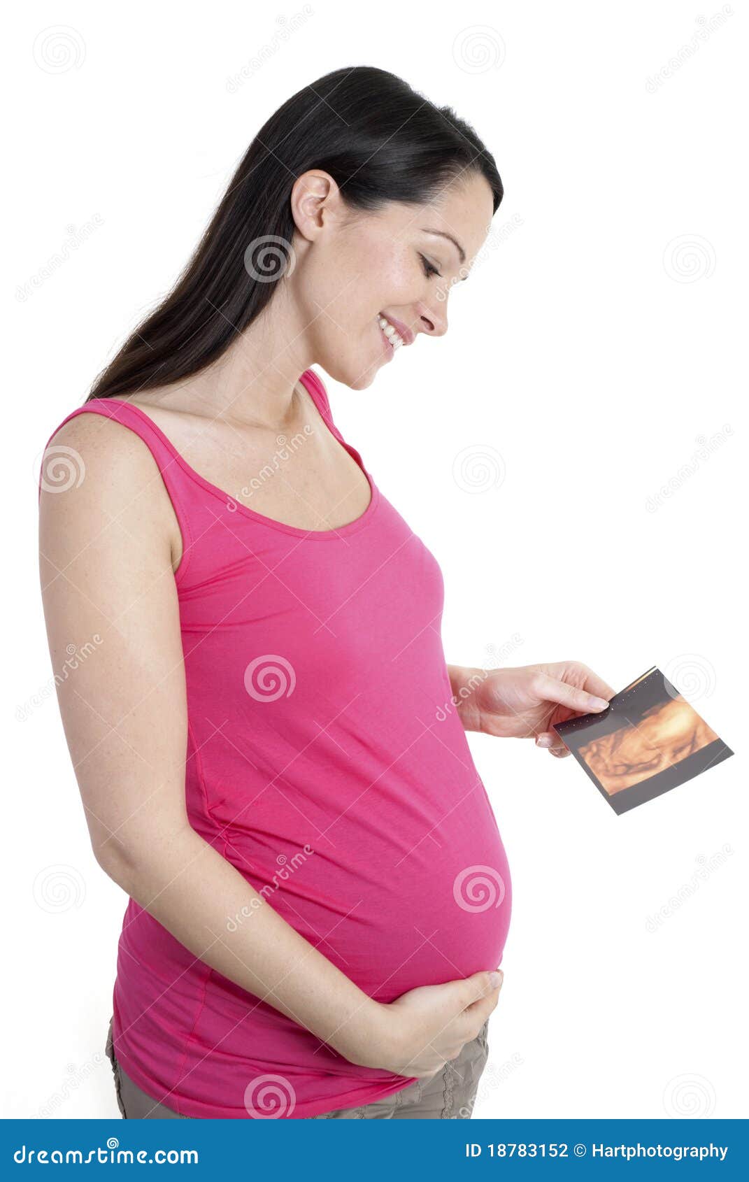 pregnant woman holding 4d scan