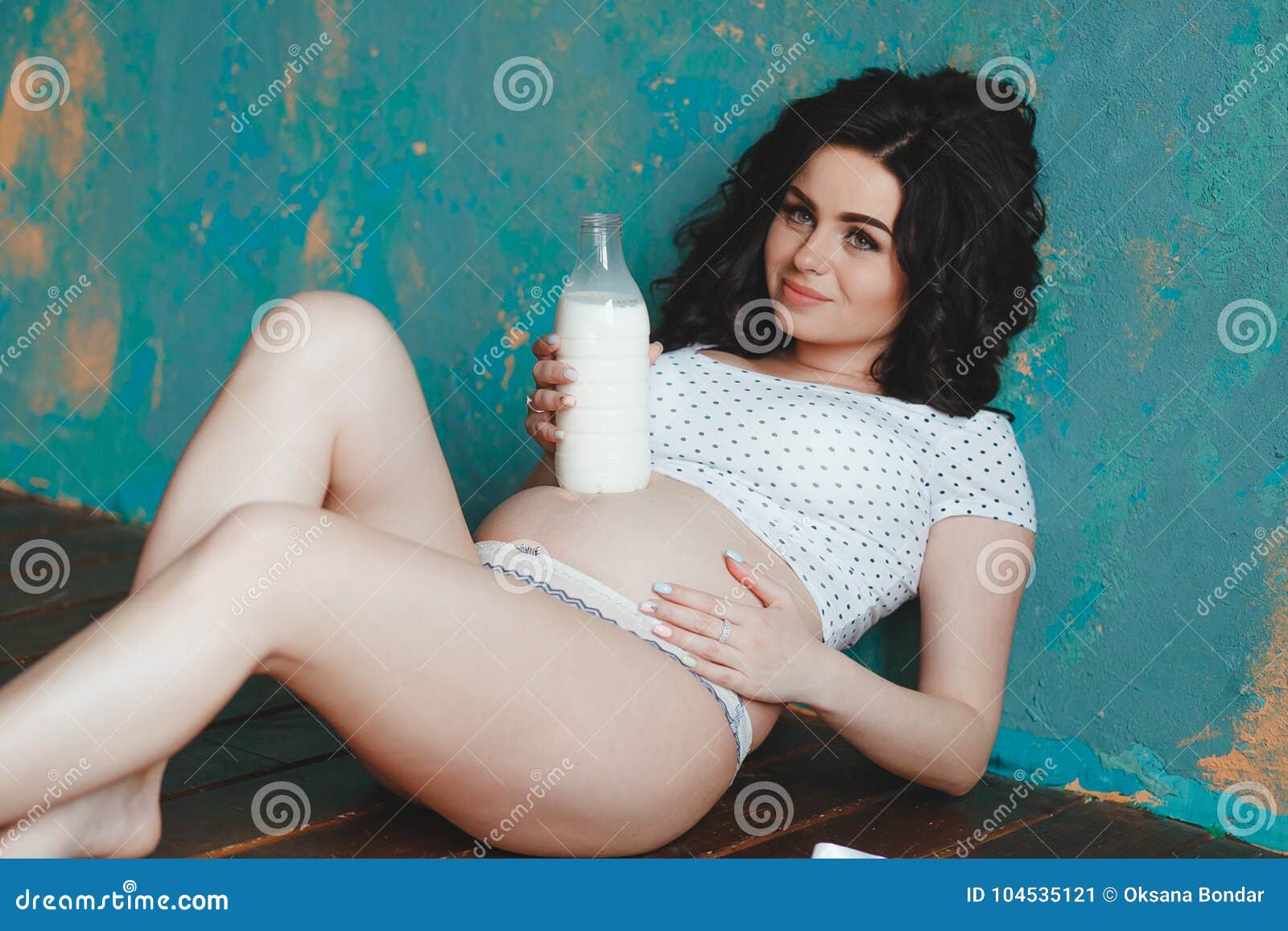 Pregnant Woman Holding Milk Bottle Nourish The Fetus And Her Body To