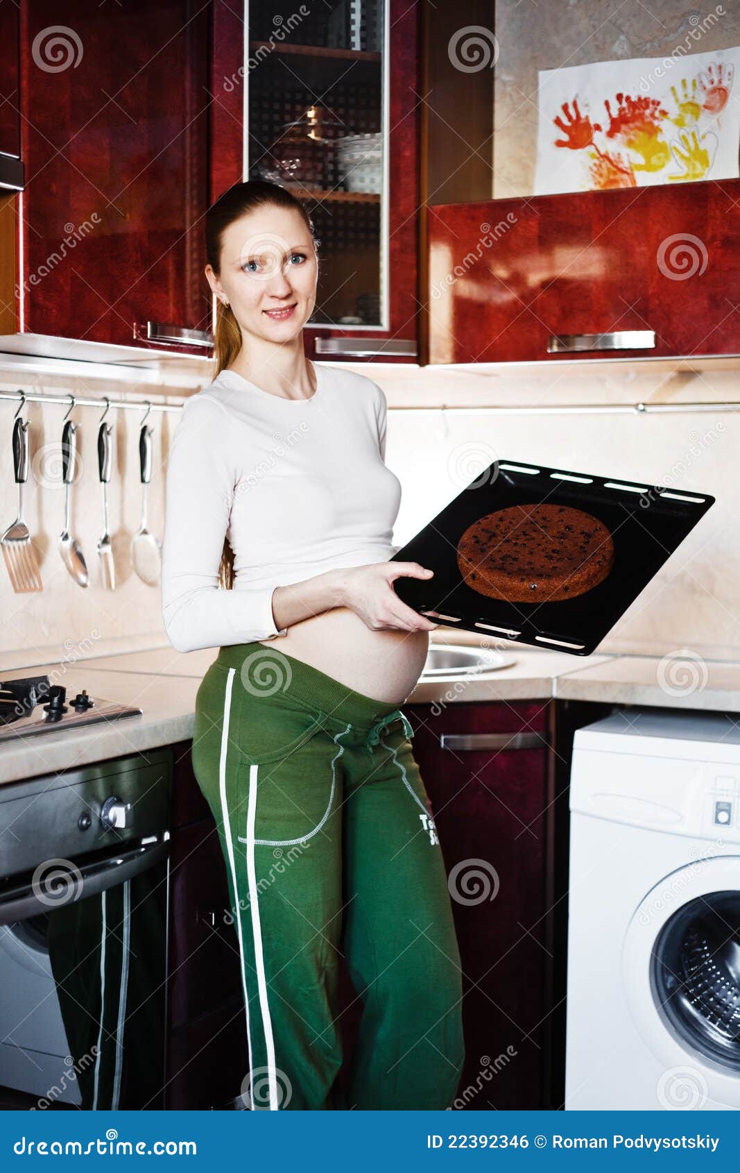 Pregnant Woman in a Kitchen Cooking Stock Photo Image of oven