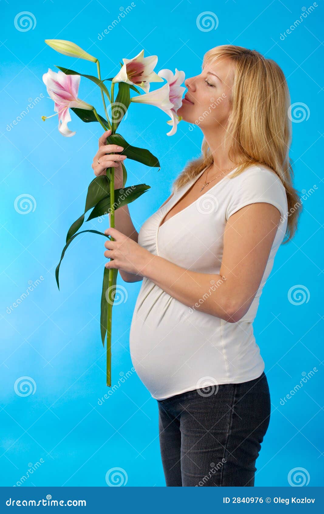 Pregnant woman with lily stock photo. Image of parent 2840976