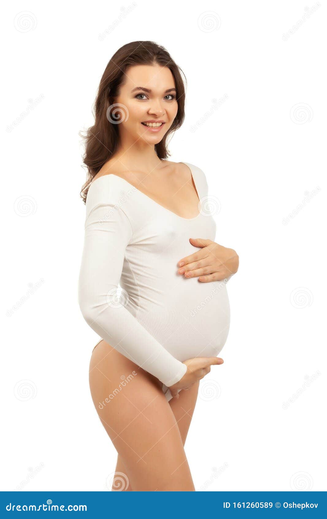 Beautiful Woman with Perfect Body in White Bodysuit Stock Photo