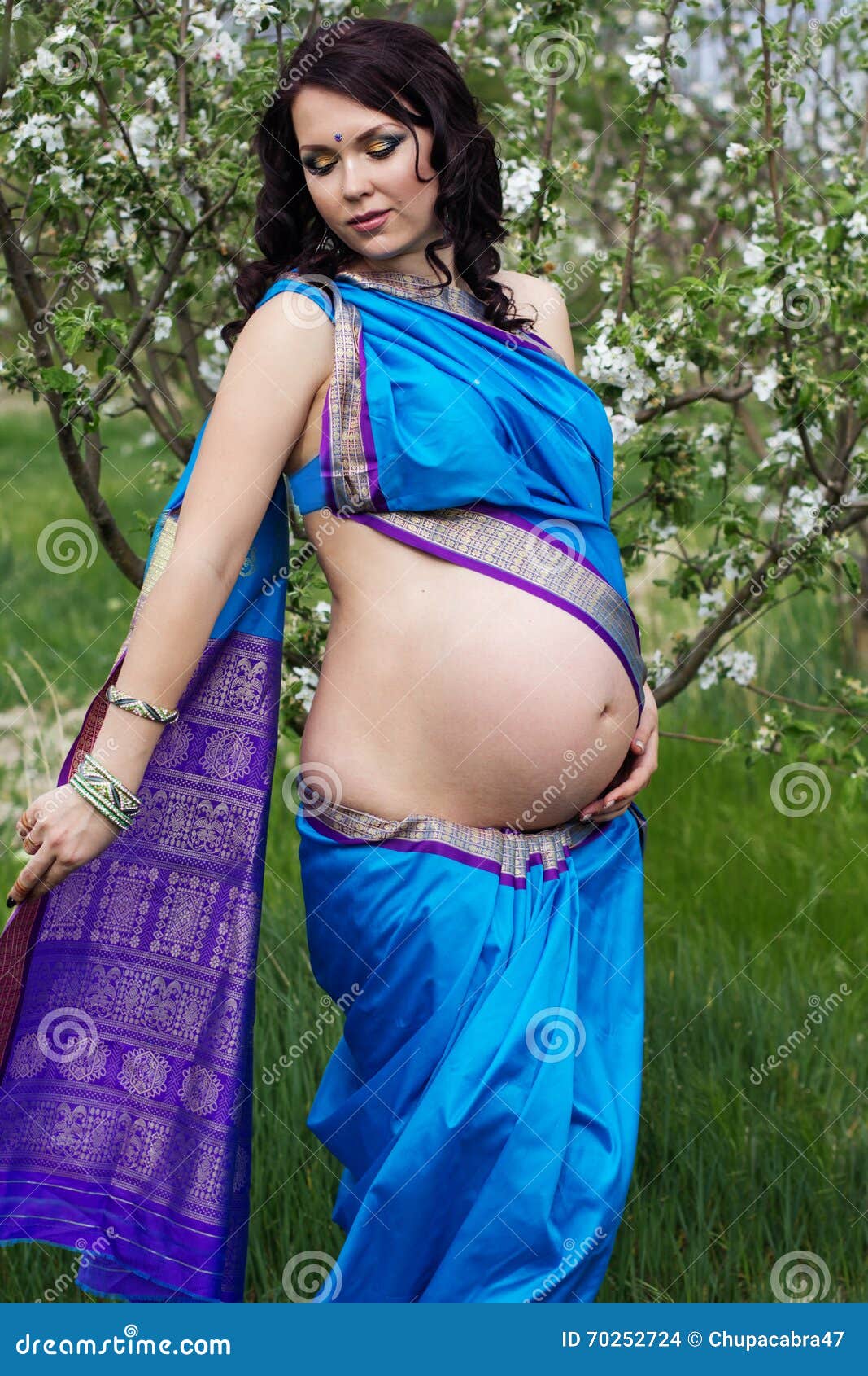 Pregnant Woman is Wearing Blue Sari Outdoors Stock Photo - Image of  flowers, garden: 70252724