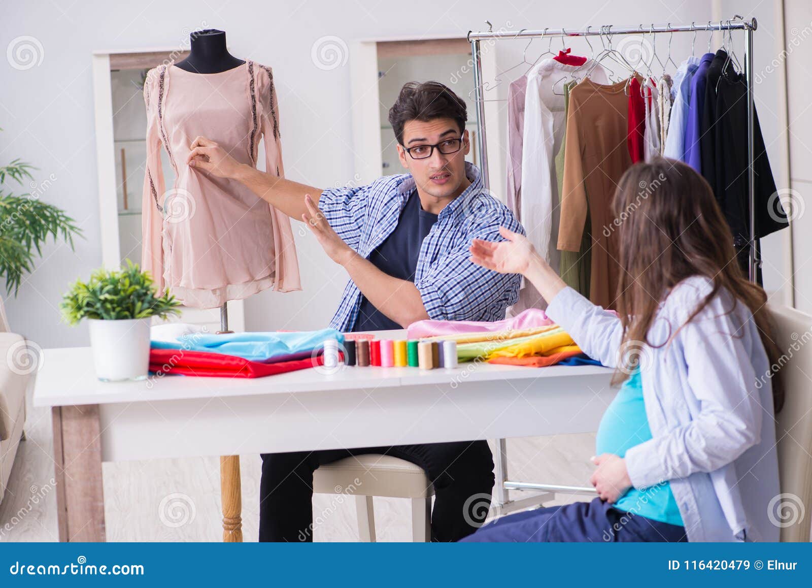 The Pregnant Woman Visiting Tailor for New Clothing Stock Image - Image ...