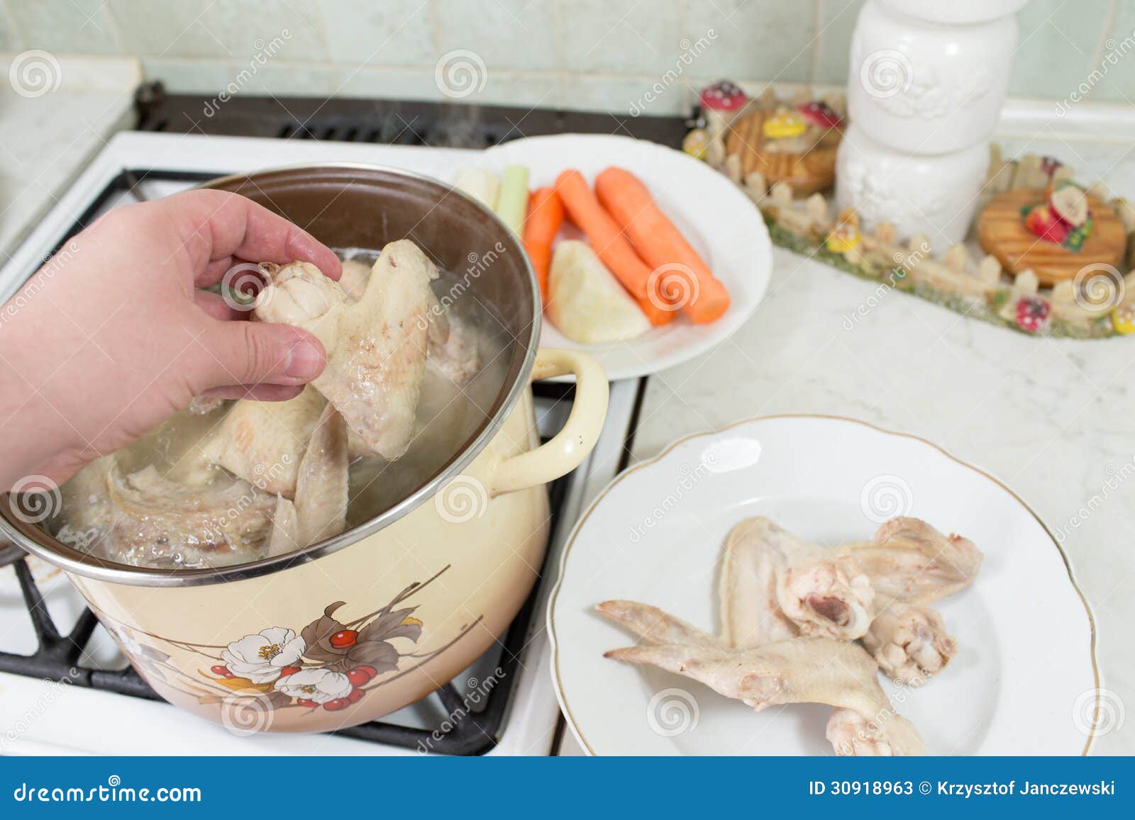 Preparation of broth. Preparation of broth with chicekn, turkey, beef, and vegetables. Polish cuisine.