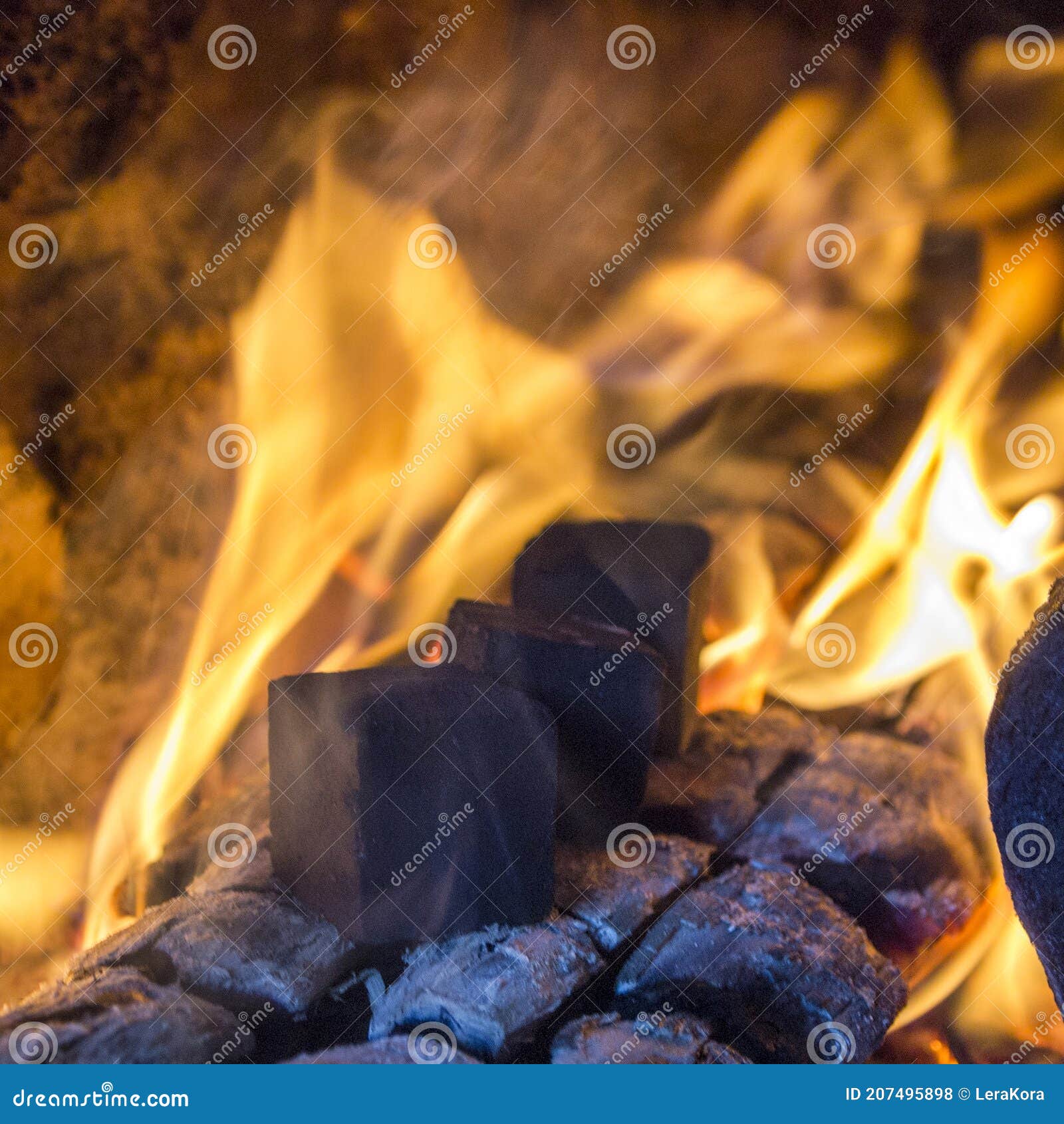 Preparation of Cube Coconut Coals for Hookah. Stock Photo Image of