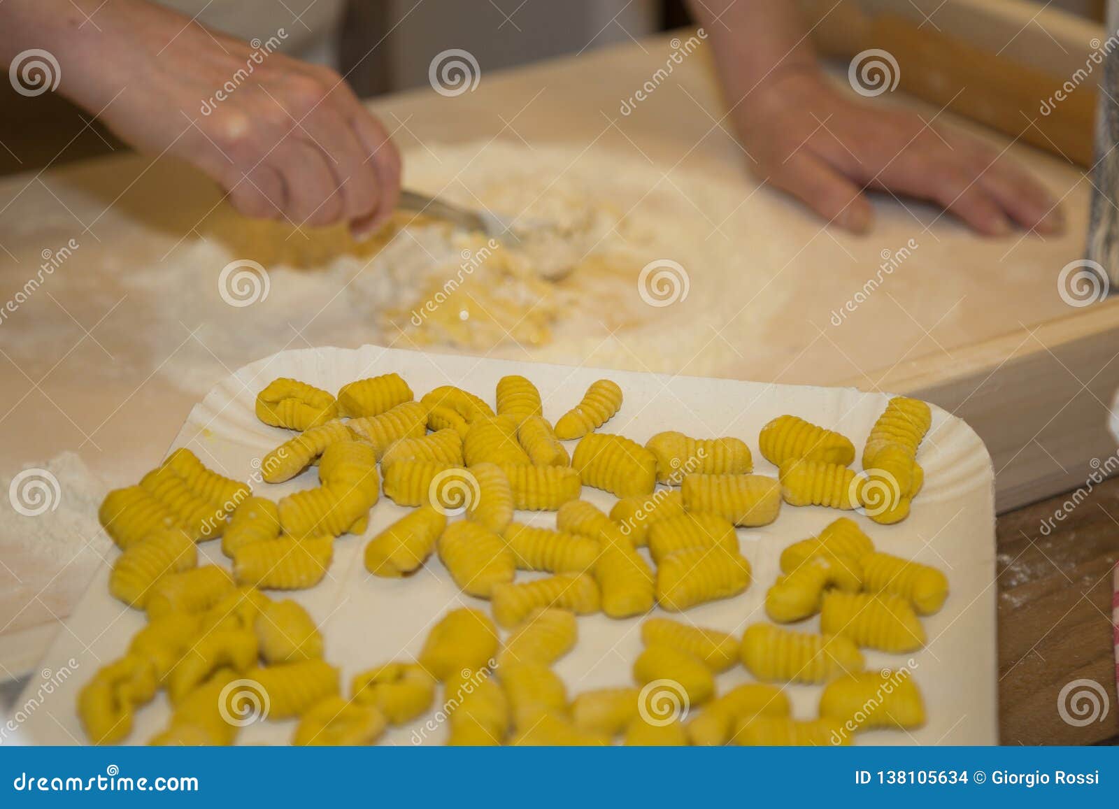 Preparation of Italian Pasta Chef at Work in the Kitchen Stock Photo