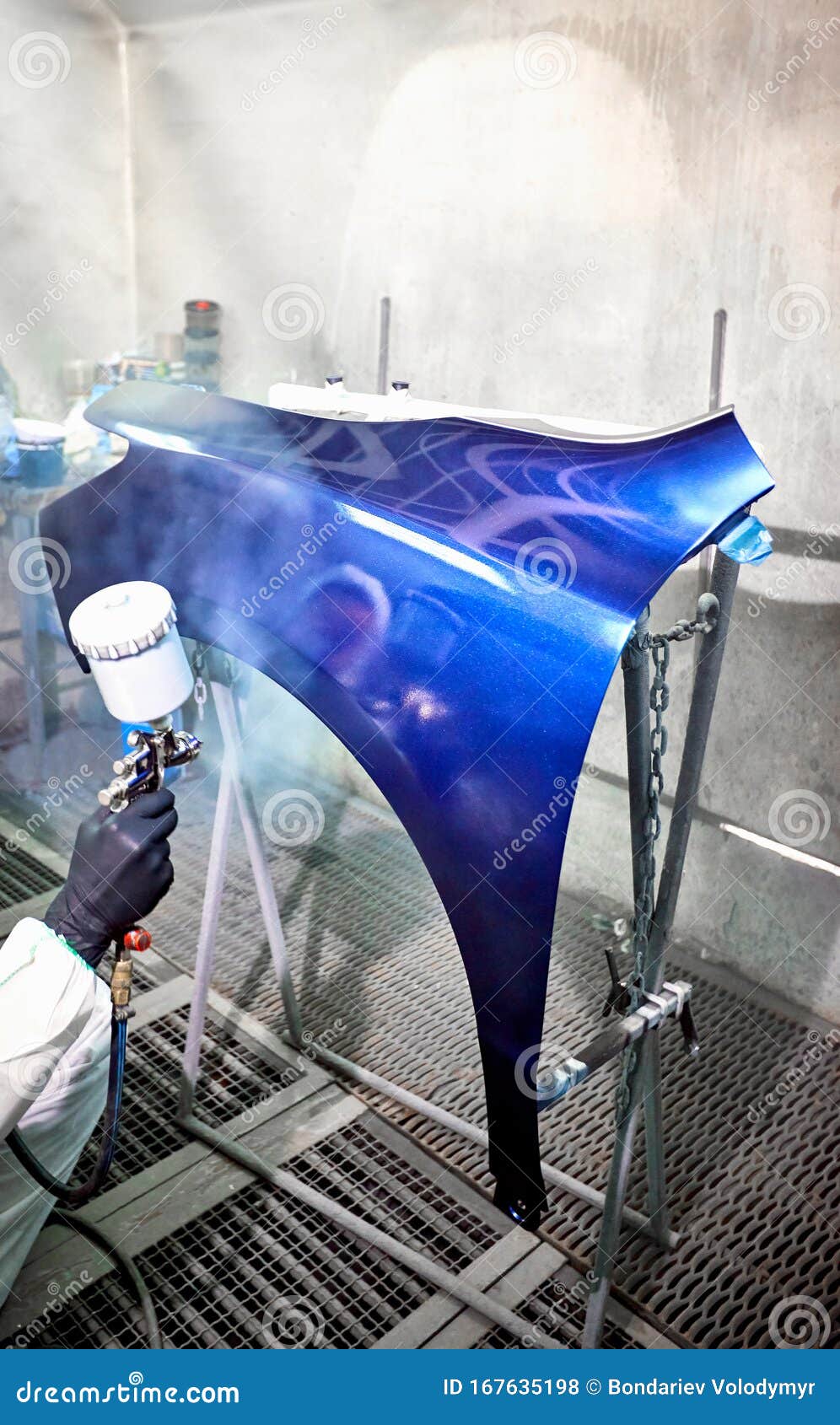 Preparation and Painting of Car Parts after an Accident Stock Photo