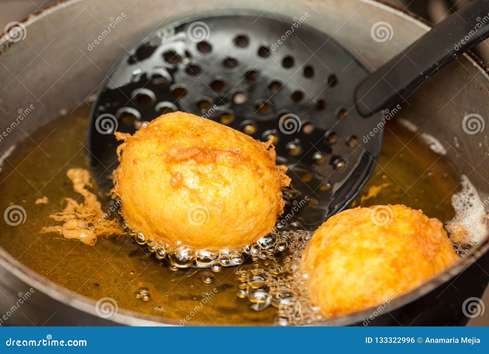 preparation steps of traditional colombian dish called stuffed potatoes