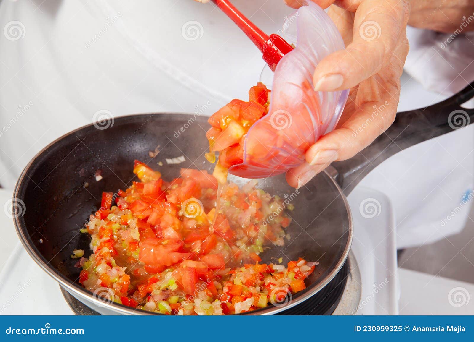 traditional colombian hogao or criollo sauce salsa criolla made of onion, tomato, peppers and cilantro