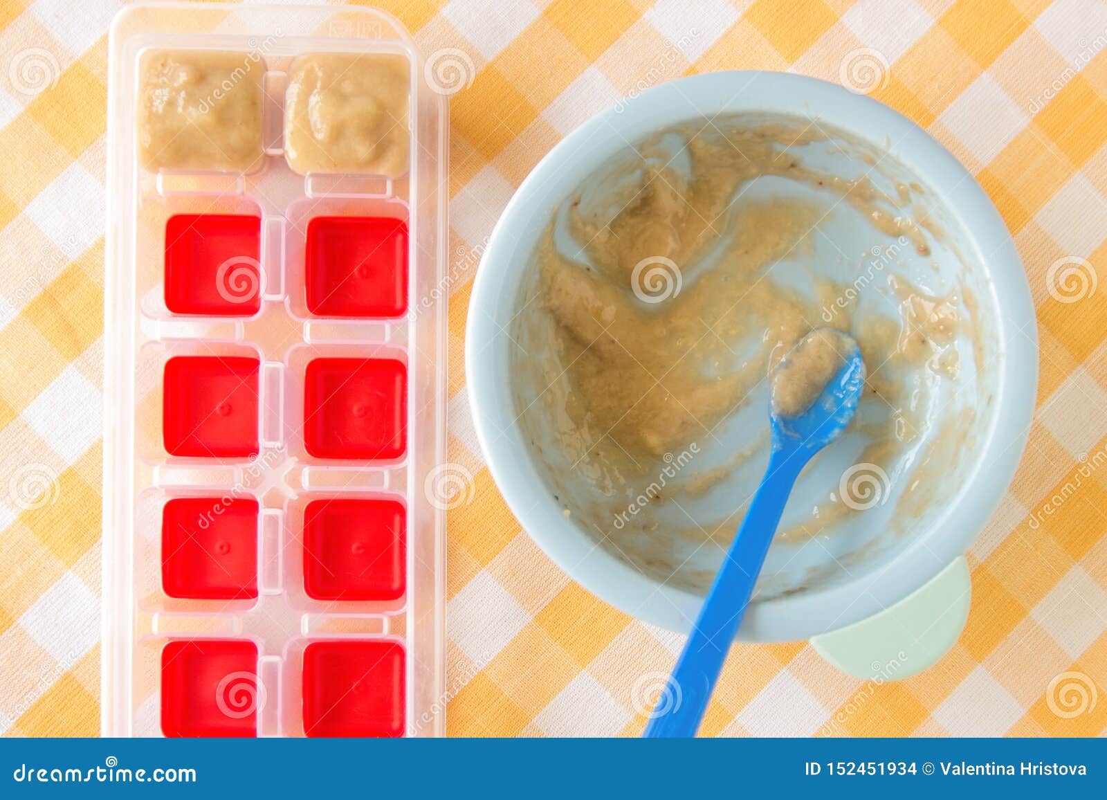 Preparing Baby Food, Homemade. Healthy Smashed Banana Mixed with