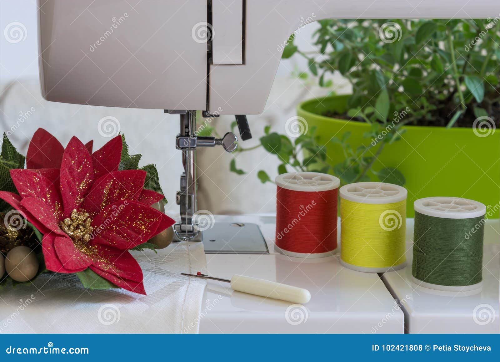 Preparing for Christmas. Sewing Machine Sewing a Christmas Decorations