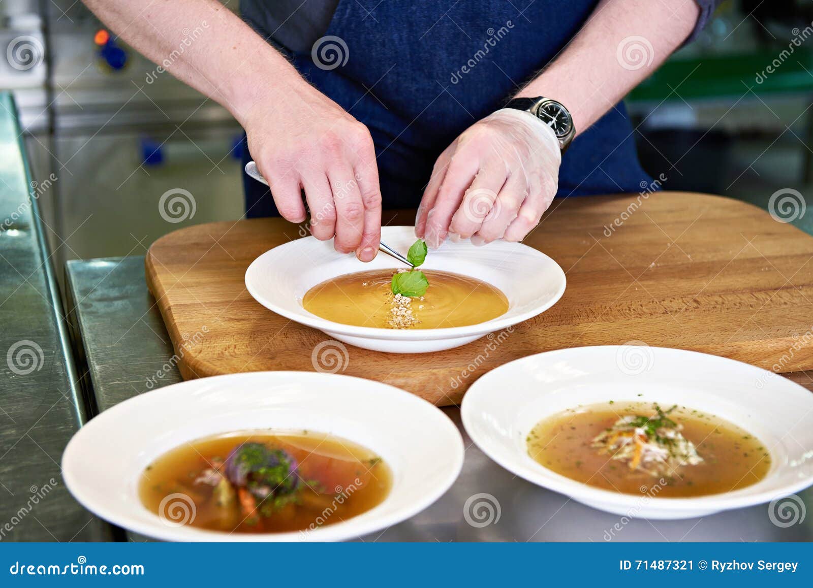 Preparing Dishes Vegetable Soup on Restaurant Kitchen Stock Image