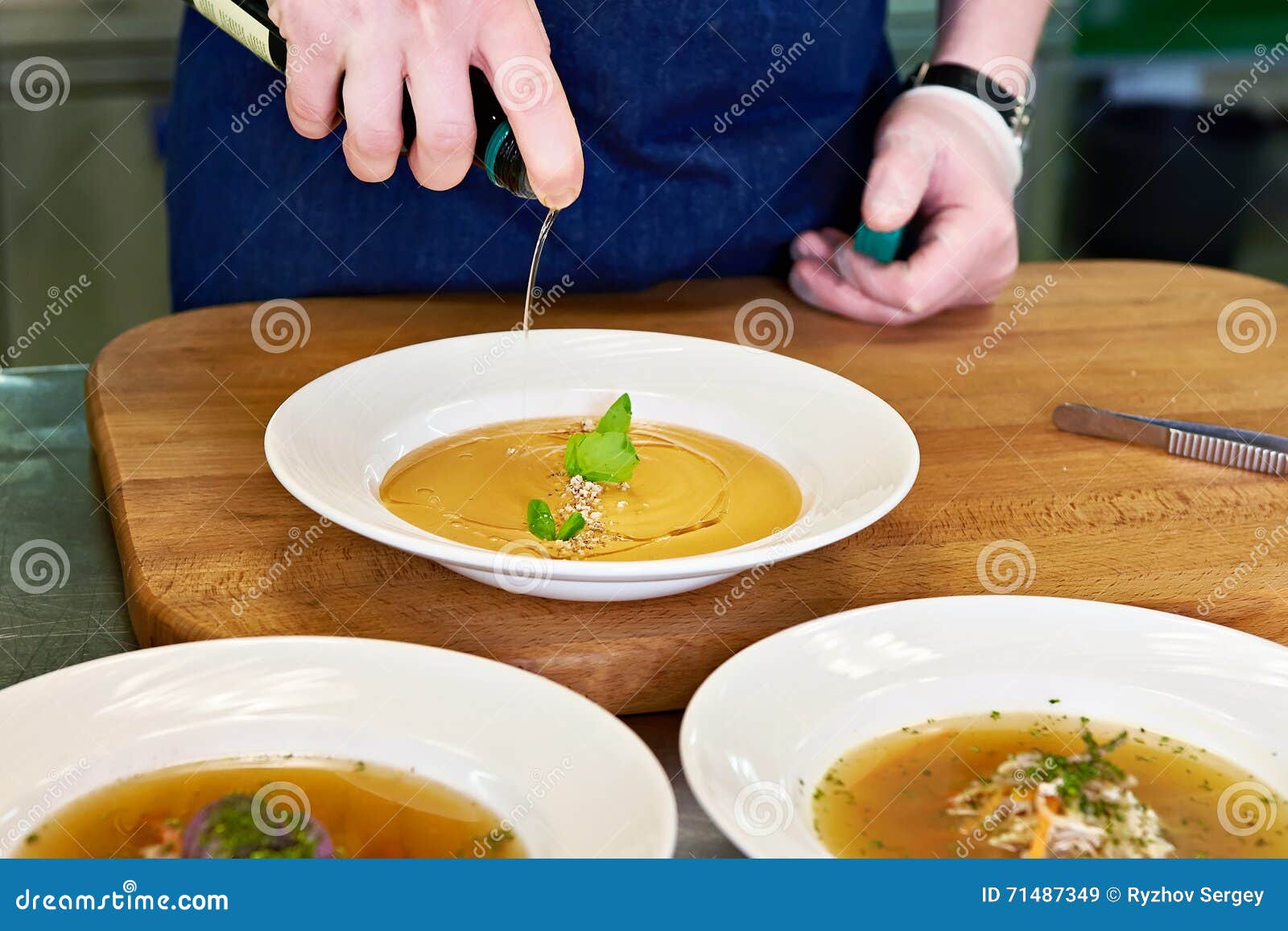 Preparing Dishes Vegetable Soup on Restaurant Kitchen Stock Image