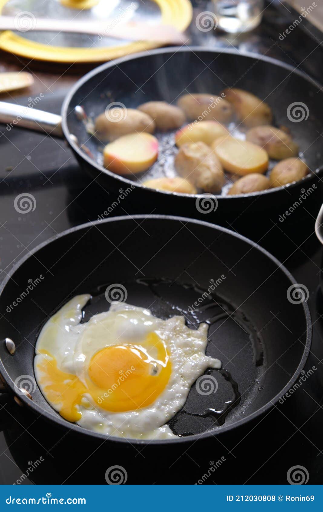 Preparing Fried Eggs in a Frying Pan Stock Photo Image of dinner