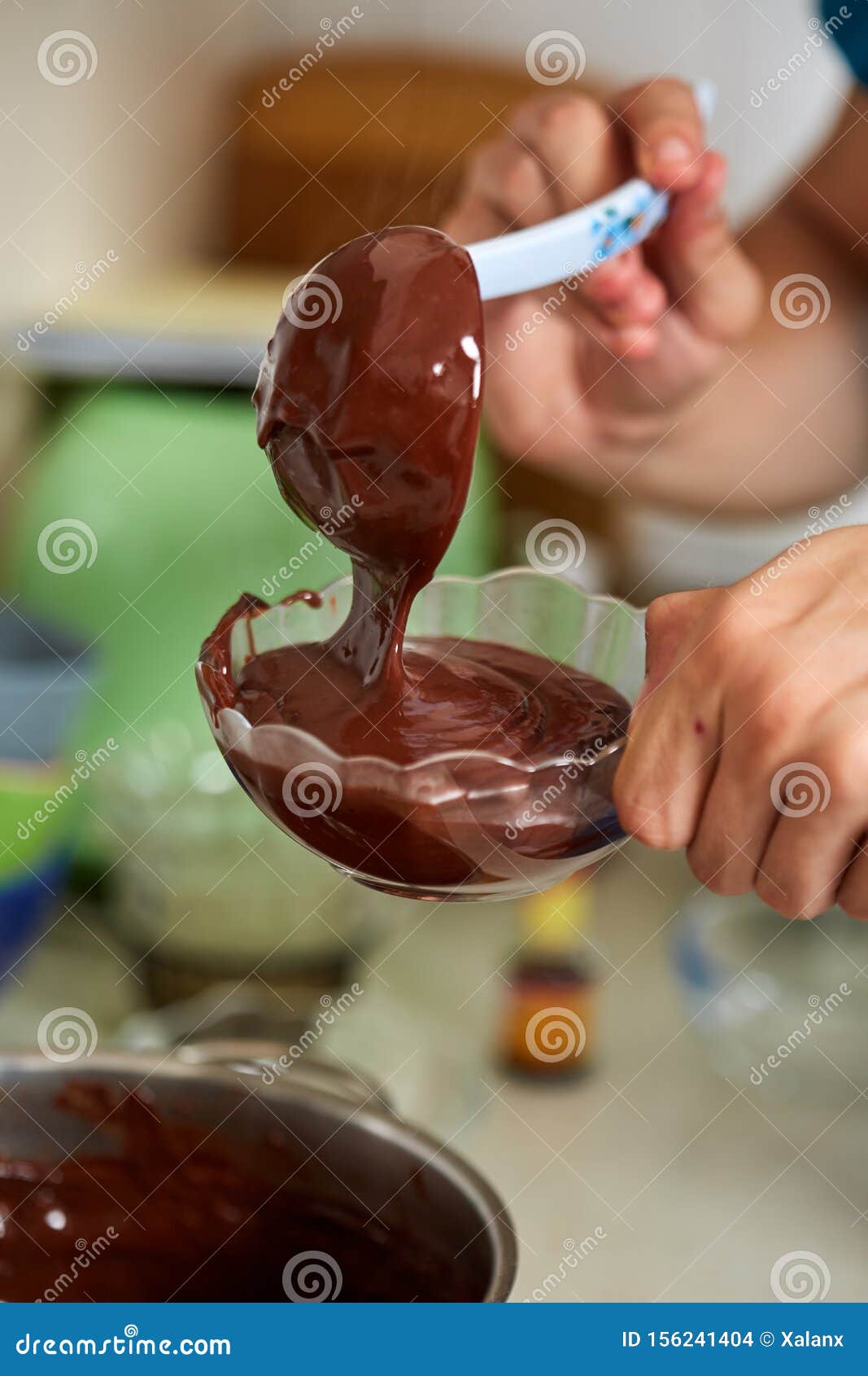 Preparing Homemade Chocolate Pudding, Closeup on Hands Stock Photo