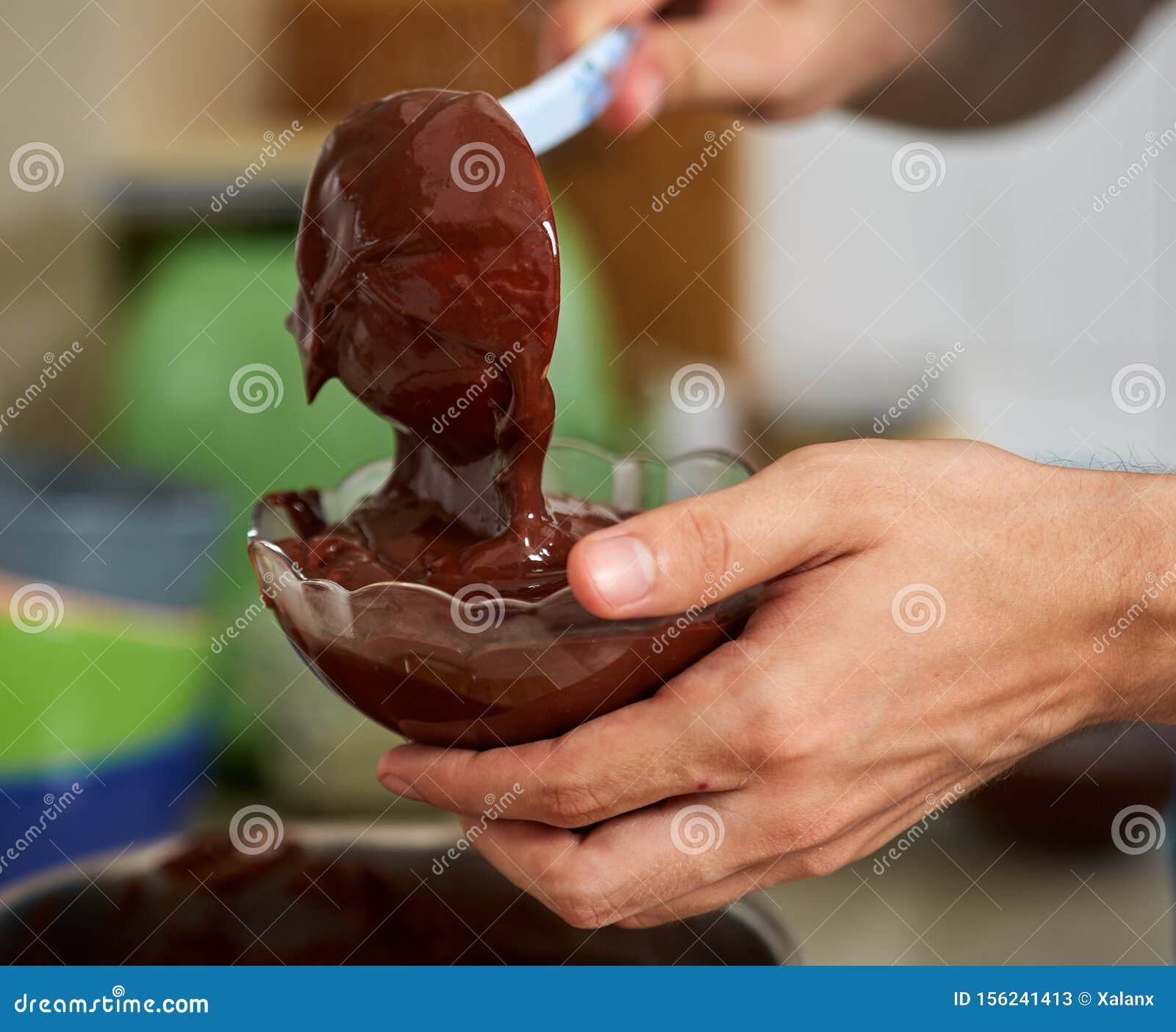 Preparing Homemade Chocolate Pudding, Closeup on Hands Stock Image