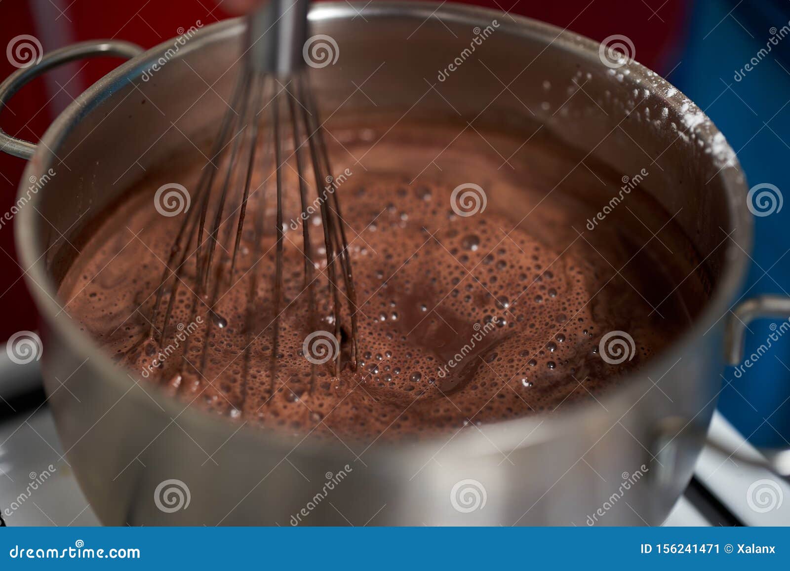 Preparing Homemade Chocolate Pudding, Closeup on Hands Stock Image