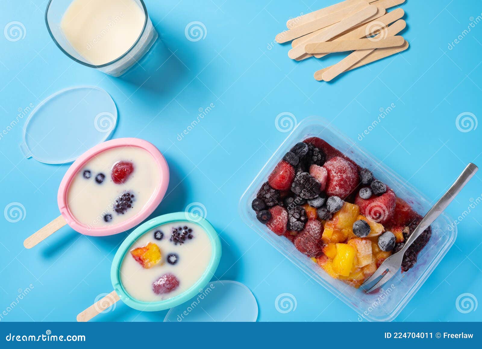 Preparing Milk Popsicle with Various Fruit Slices Stock Image Image