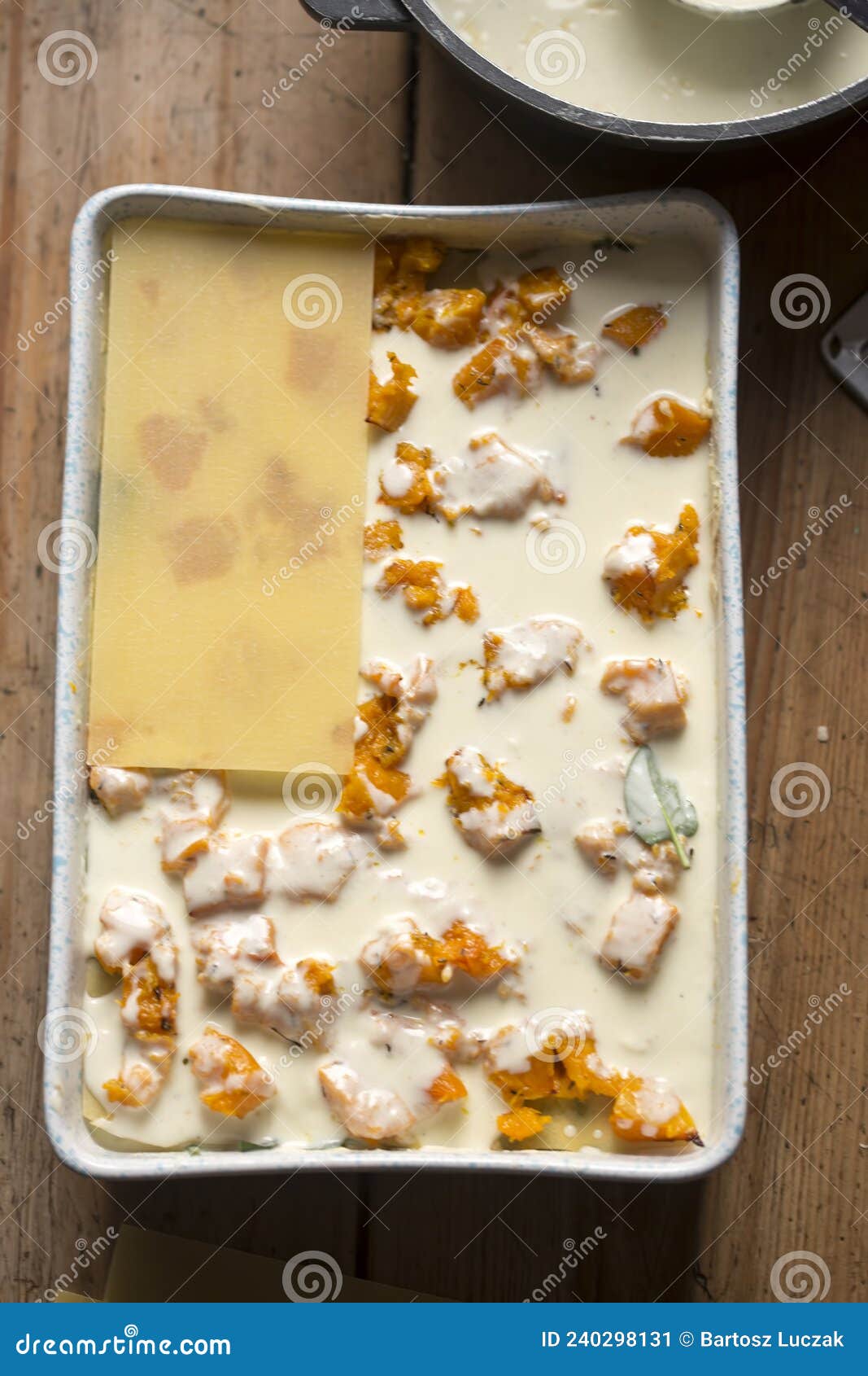 Preparing Vegetarian Lasagne with Pumpkin, Spinach, Three Cheese Stock