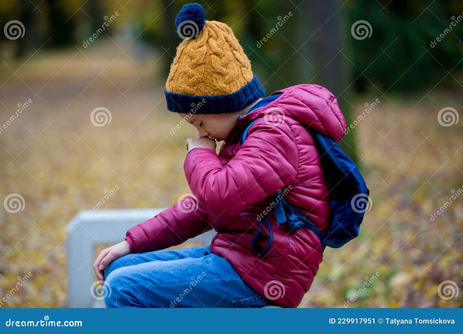 preschool child, boy, sneezing in park, flu season