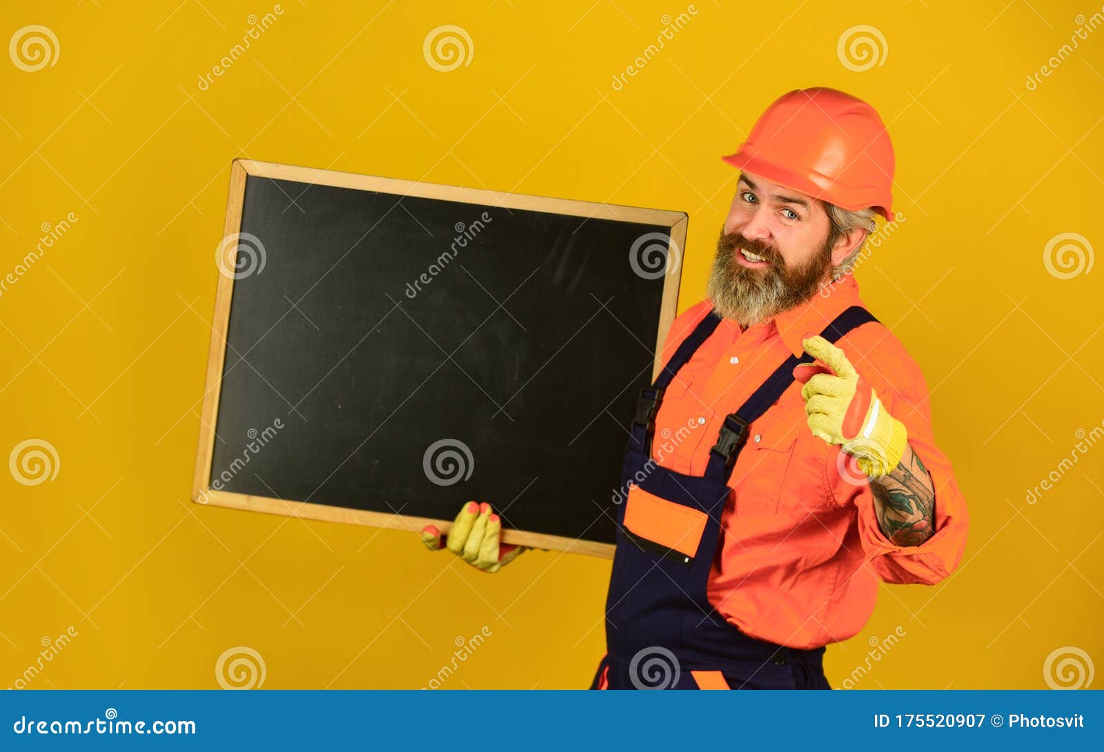 Presentation on Blackboard Plan for Construction. Builder Man Serious