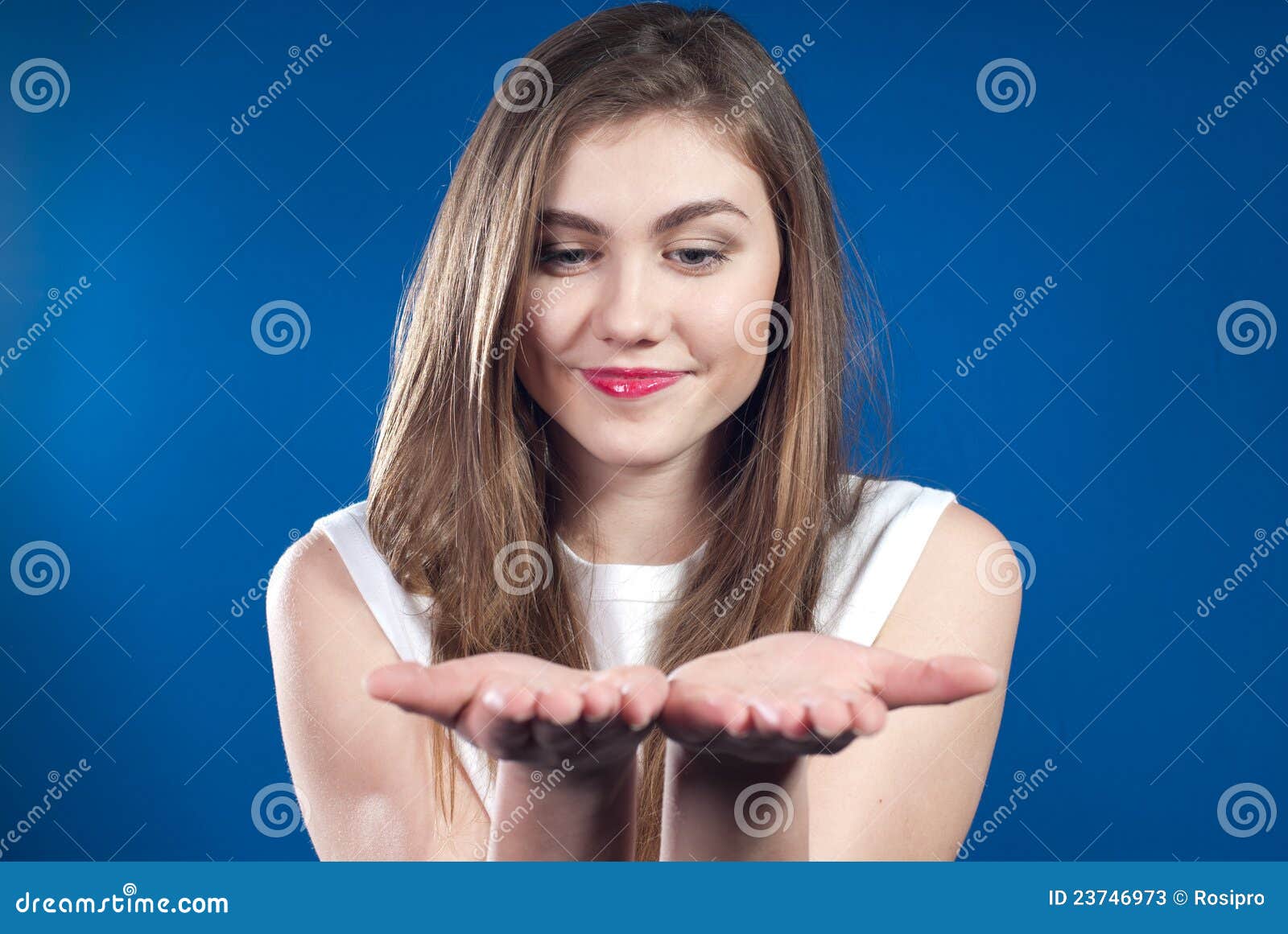 Presenting or Showing by Young Woman with Palms Up Stock Image Image